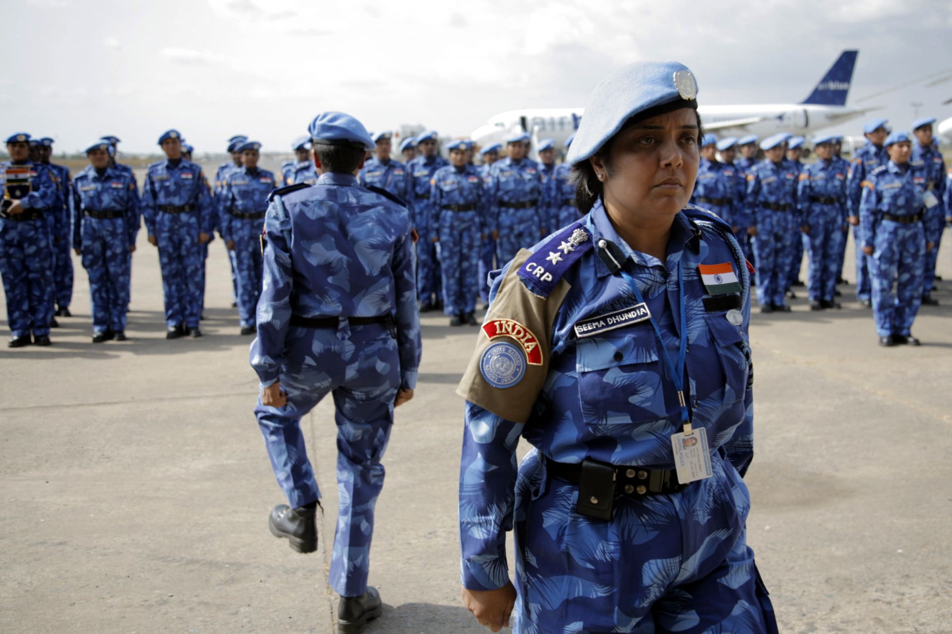 <p>The first all-female unit of UN peacekeepers stand at attention as they arrive outside Liberia’s capital, Monrovia, on January 30, 2007.</p>

