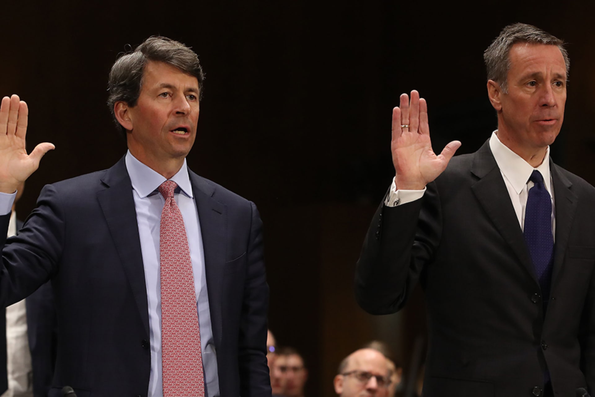 <p>Mark Begor (left), CEO of Equifax, and Arne Sorenson, CEO of Marriott International, are sworn in during a Senate Homeland Security and Governmental Affairs Committee hearing on data breaches, March 7, 2019.</p>
