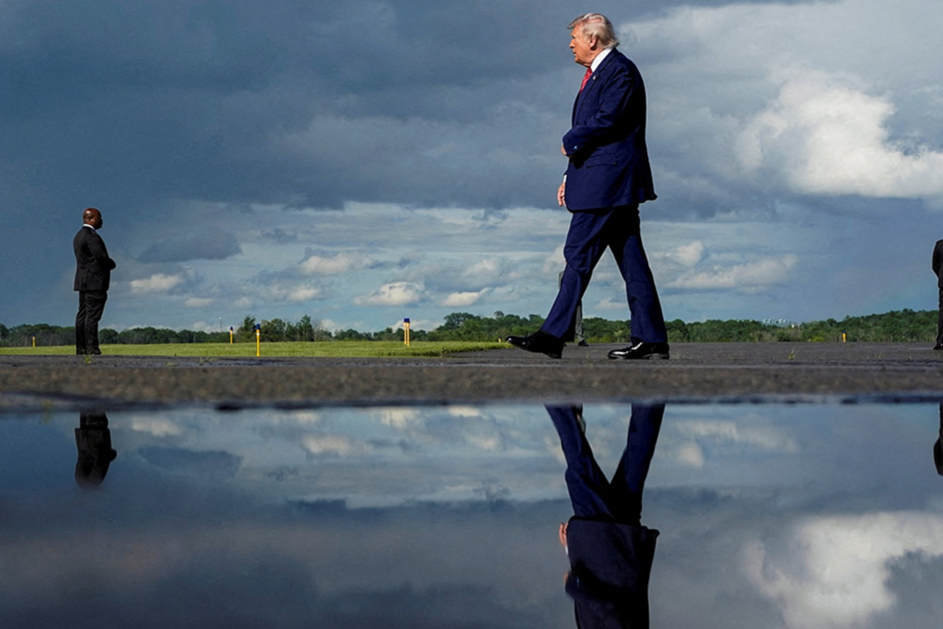 <p>President Donald Trump walks after arriving at Morristown Municipal Airport in Morristown, New Jersey, on May 23, 2025.</p>
