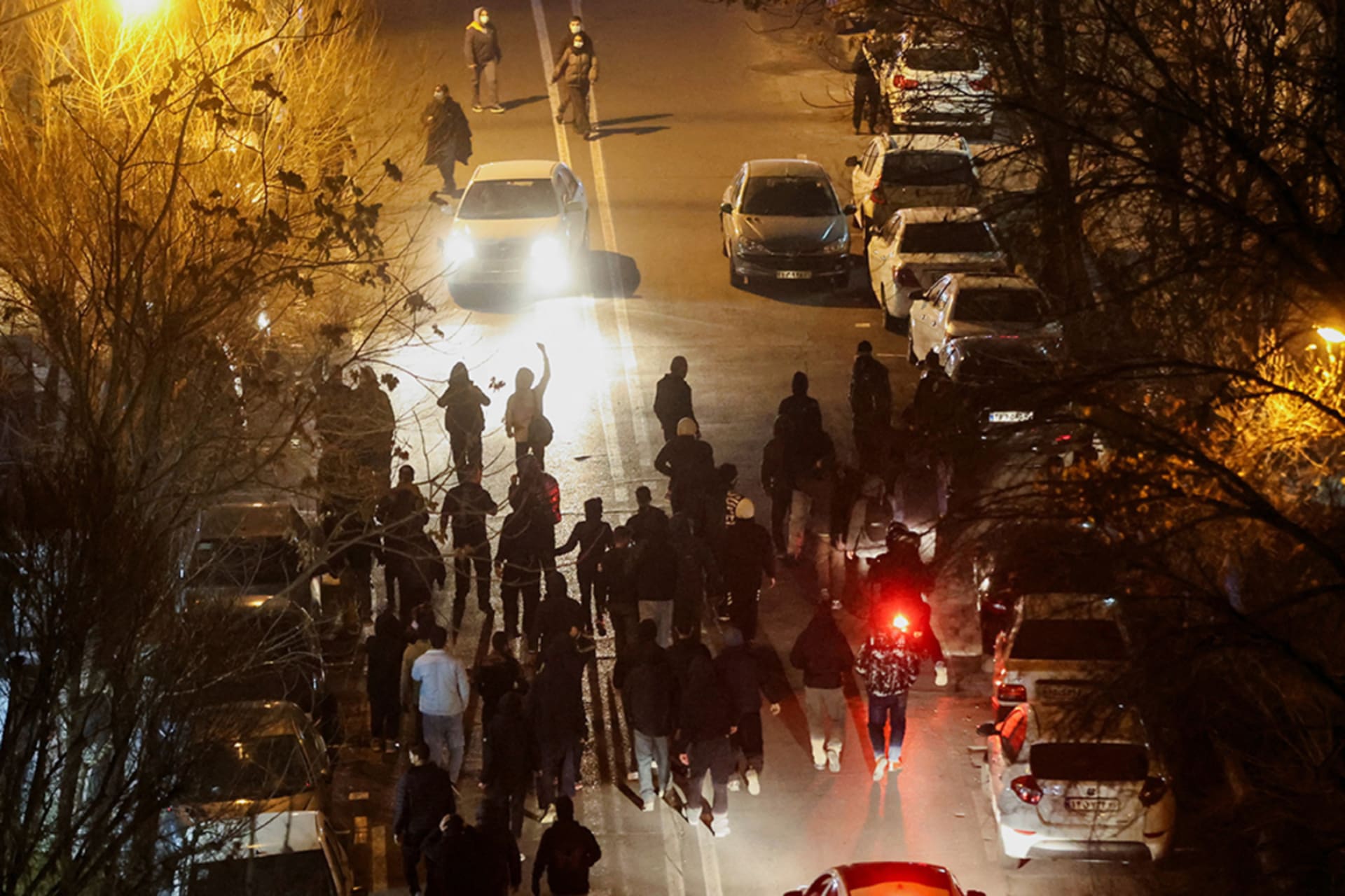 <p>Iranian demonstrators gather in a street during a protest over the collapse of the currency’s value, in Tehran, Iran, January 8, 2026.</p>
