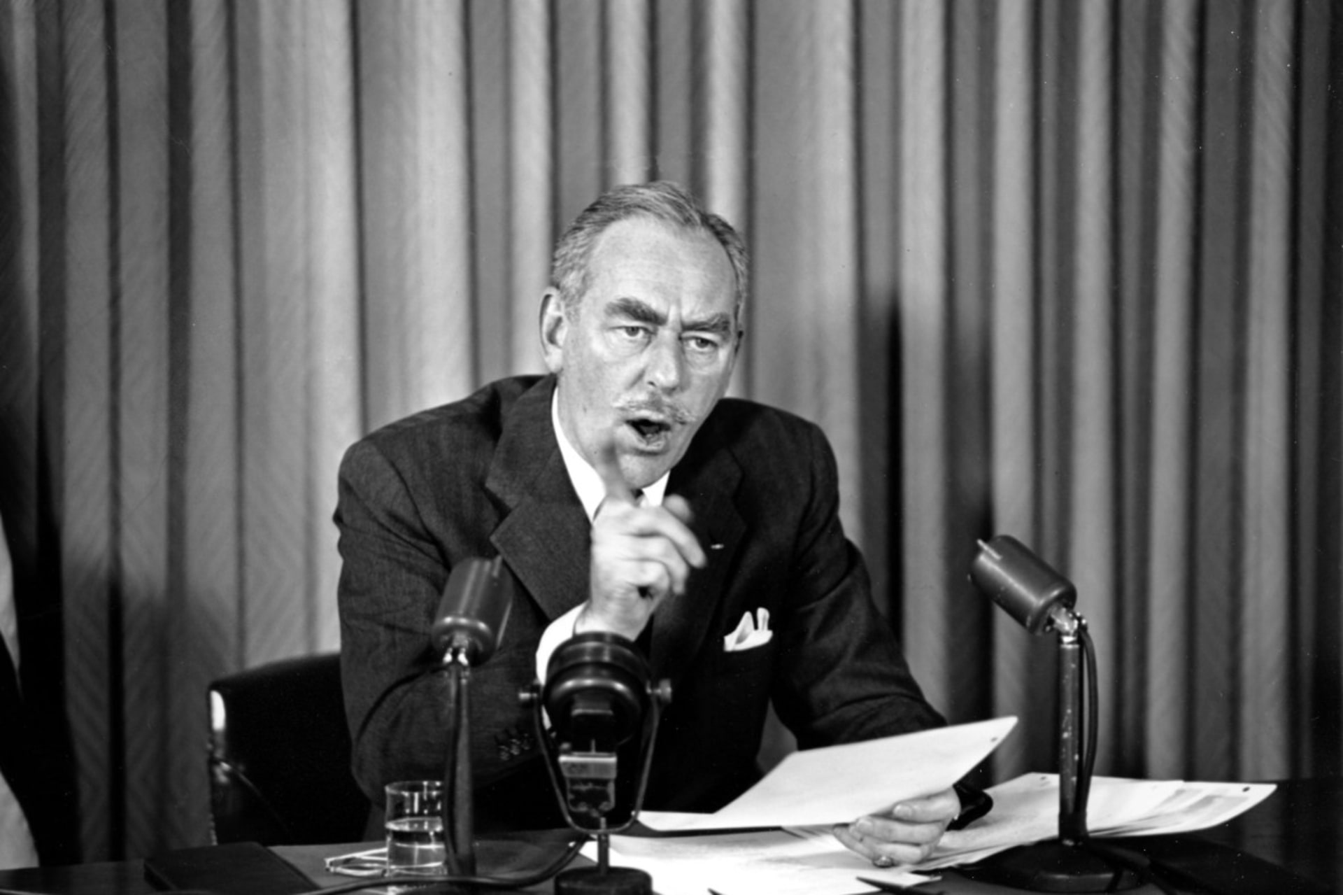 <p>Secretary of State Dean Acheson speaks from the State Department in Washington on November 29, 1950.</p>
