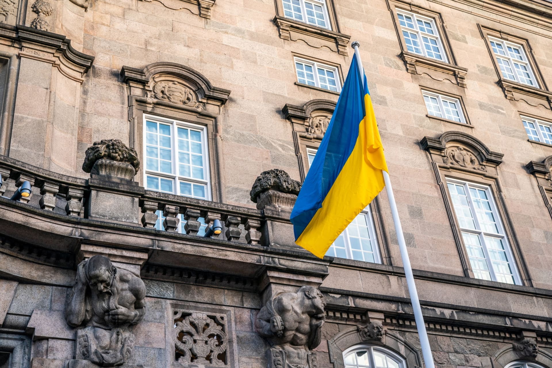 <p>Danish Parliament Folketinget hoists the Ukrainian flag next to the Danish flag, in Copenhagen.</p>