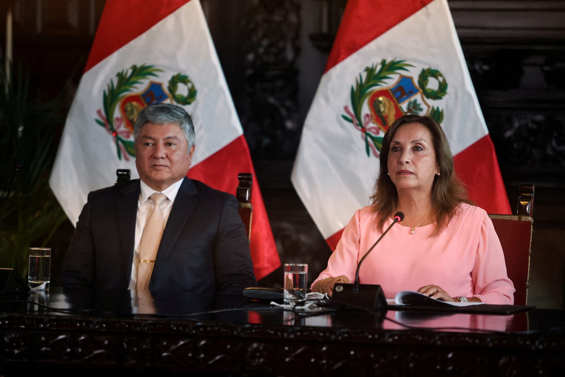 Photo of Peruvian President Dina Boluarte with her lawyer