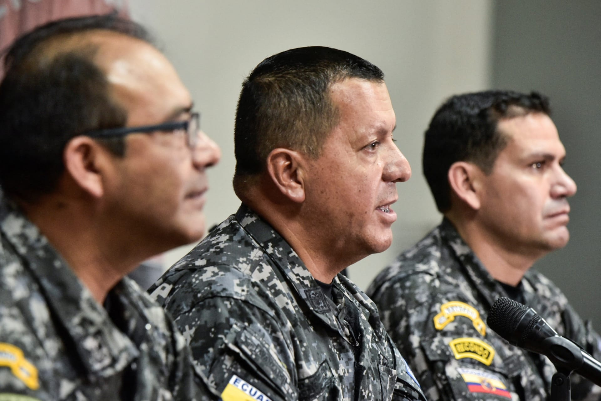 Police commander General Victor Herrera speaks at a press conference presenting detainees who stormed tv studio