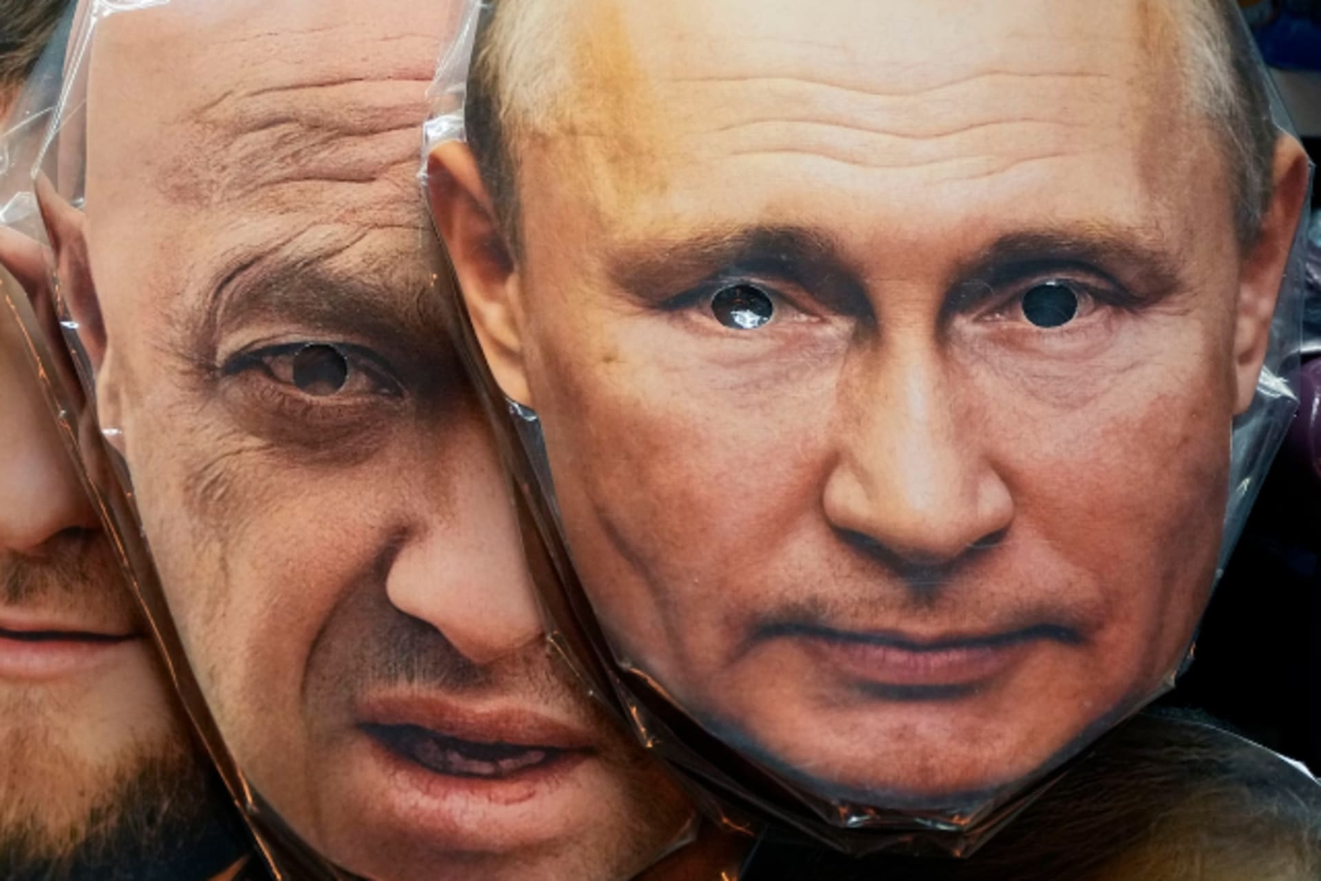 <p>Masks depicting Russian President Vladimir Putin and Wagner Group leader Yevgeniy Prigozhin are displayed in St. Petersburg on June 4.</p>
