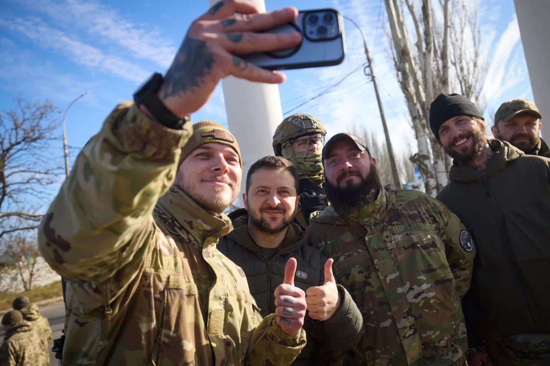 <p>Ukrainian soldiers take a selfie with President Volodymyr Zelensky during his visit to Kherson, Ukraine, on Nov. 14. </p>
