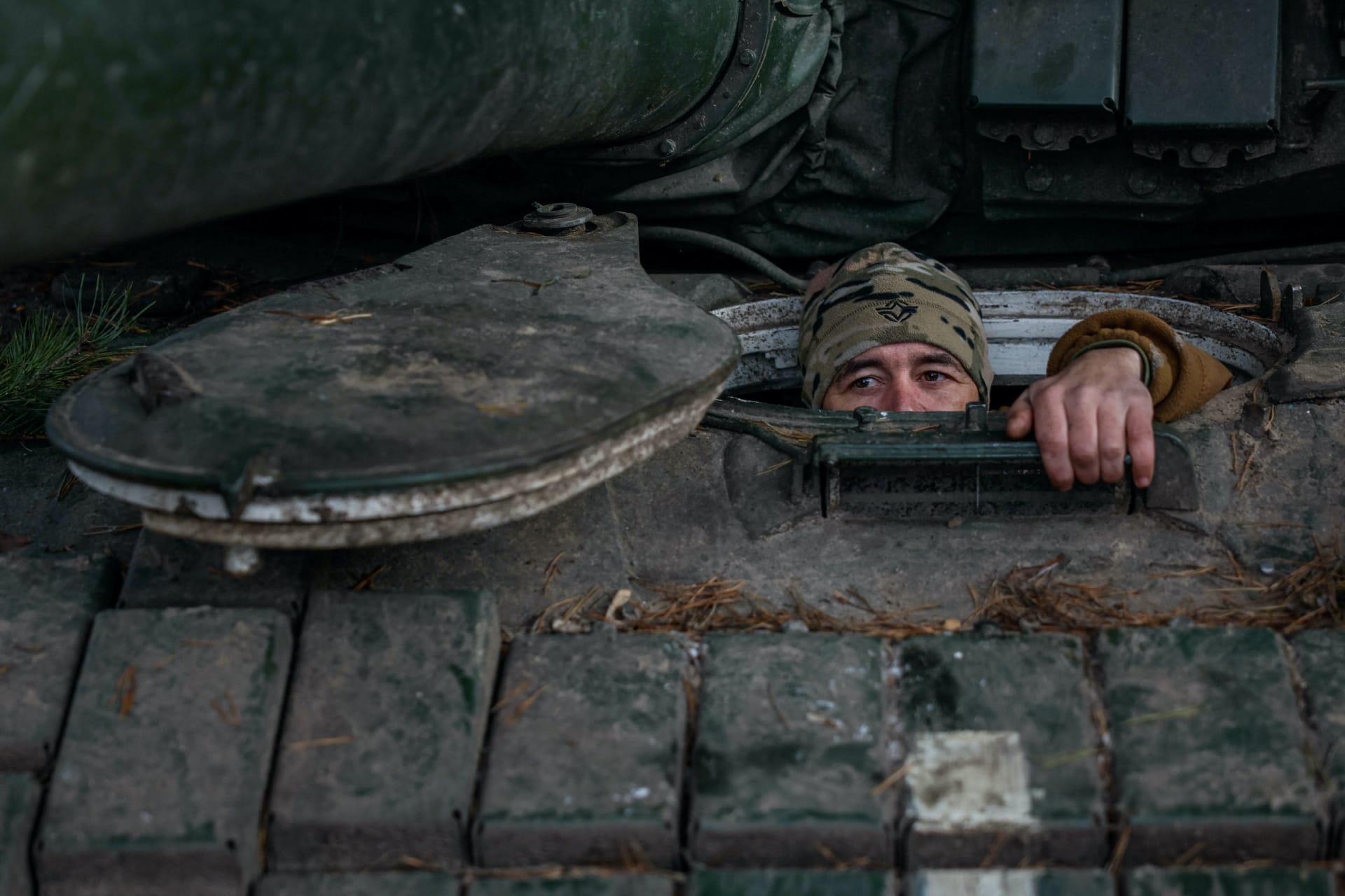 <p>A serviceman of the 4th Separate Tank Brigade sits in a T-72 main battle tank near a frontline in Donetsk region.</p>
