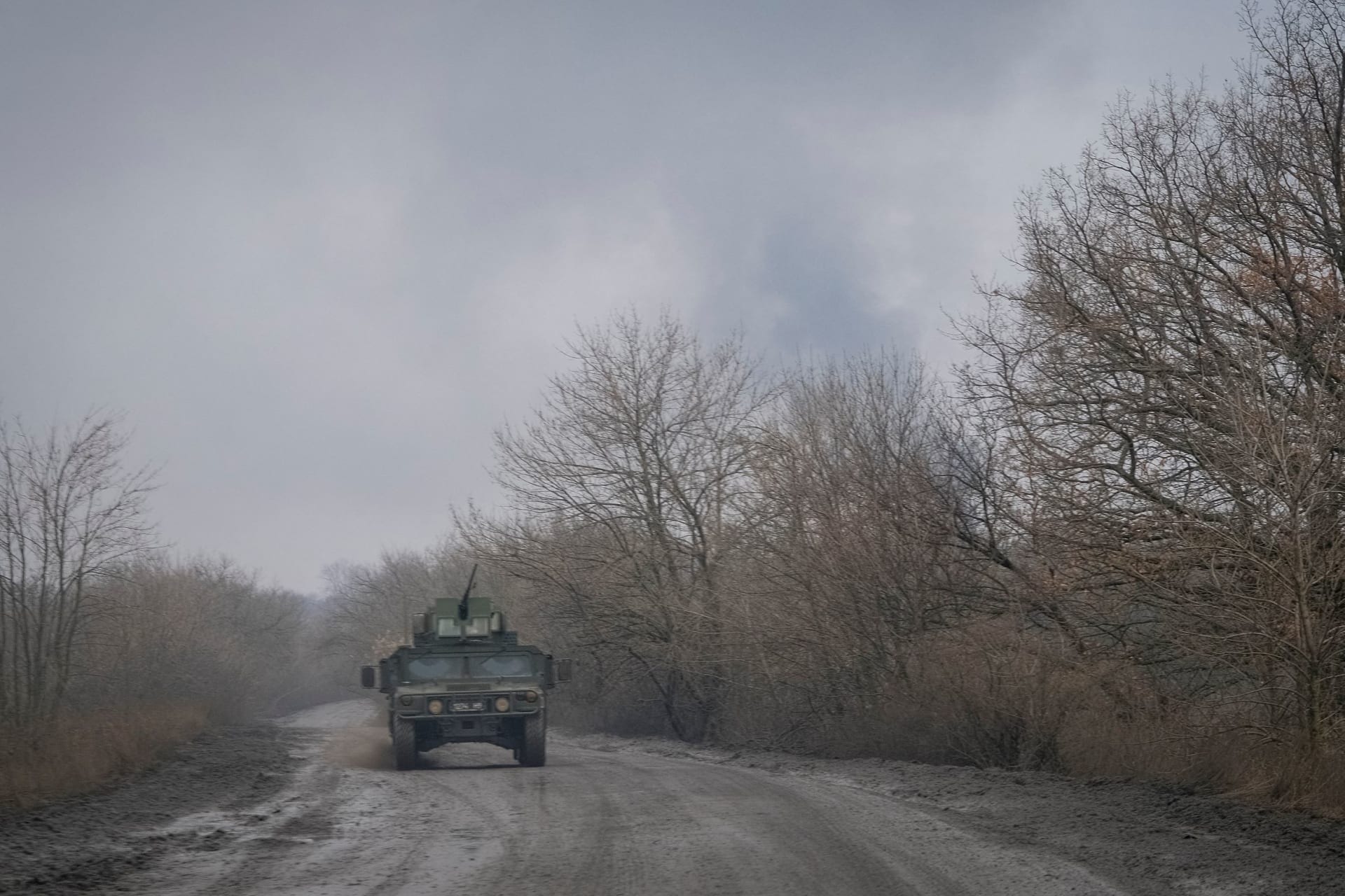 <p>Ukrainian service members ride a military vehicle near the city of Chasiv Yar.</p>