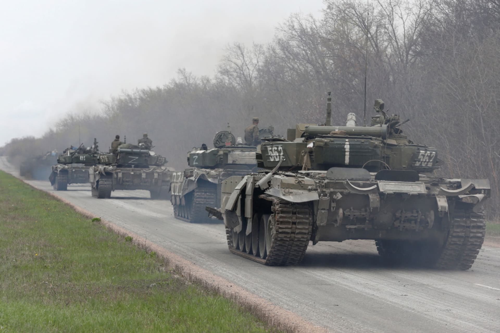 <p>Tanks of pro-Russian troops drive along a road near Mariupol.</p>
