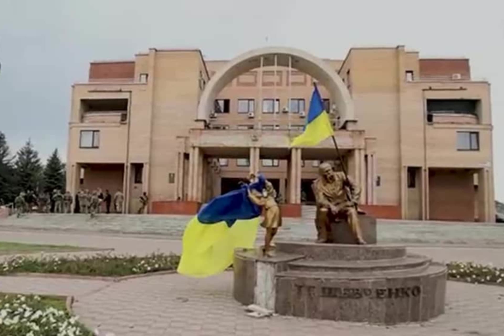 A framegrab taken from a handout video made available by the Ukrainian Defense Ministry shows Ukrainian flags flown in central Balakliya, Kharkiv oblast, Ukraine, on Sept. 10.