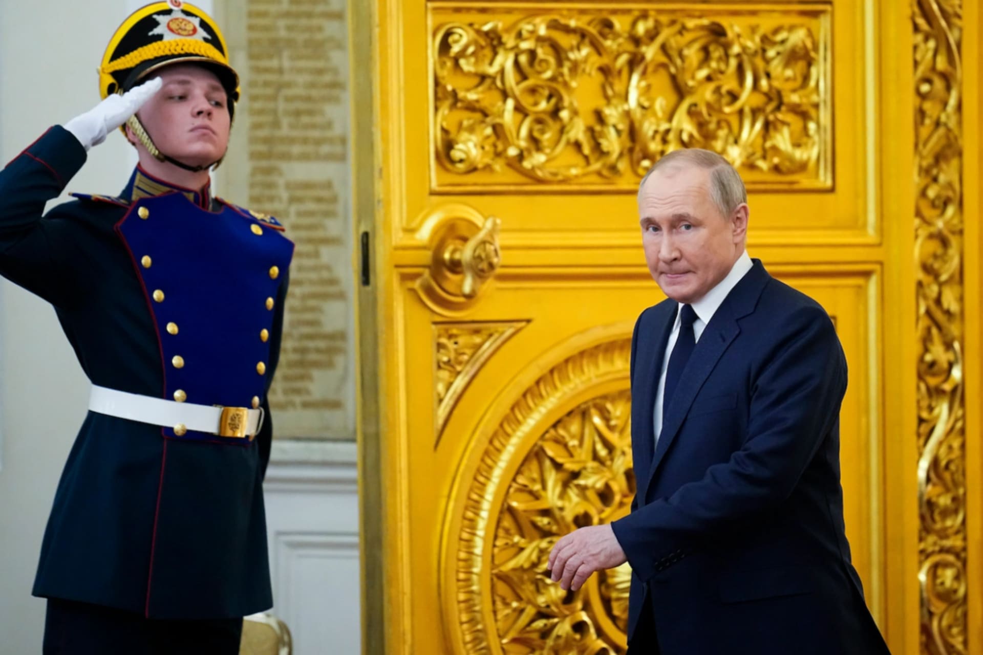 <p>Russian President Vladimir Putin arrives to deliver speech at the Kremlin in Moscow on April 26.</p>
