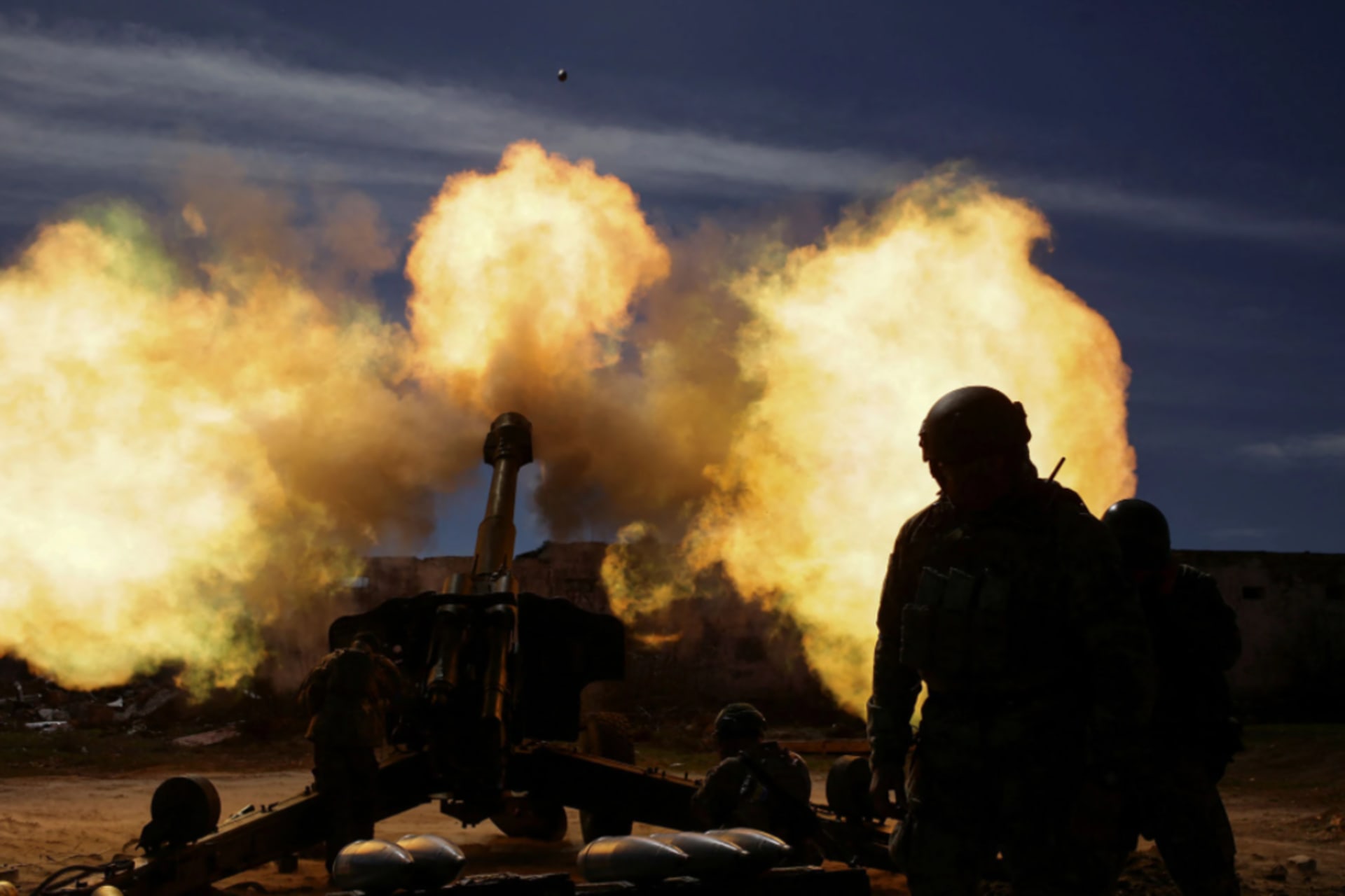 <p>Members of the Ukrainian Volunteer Corps fire a howitzer in the Zaporizhzhia region of Ukraine on March 28</p>
