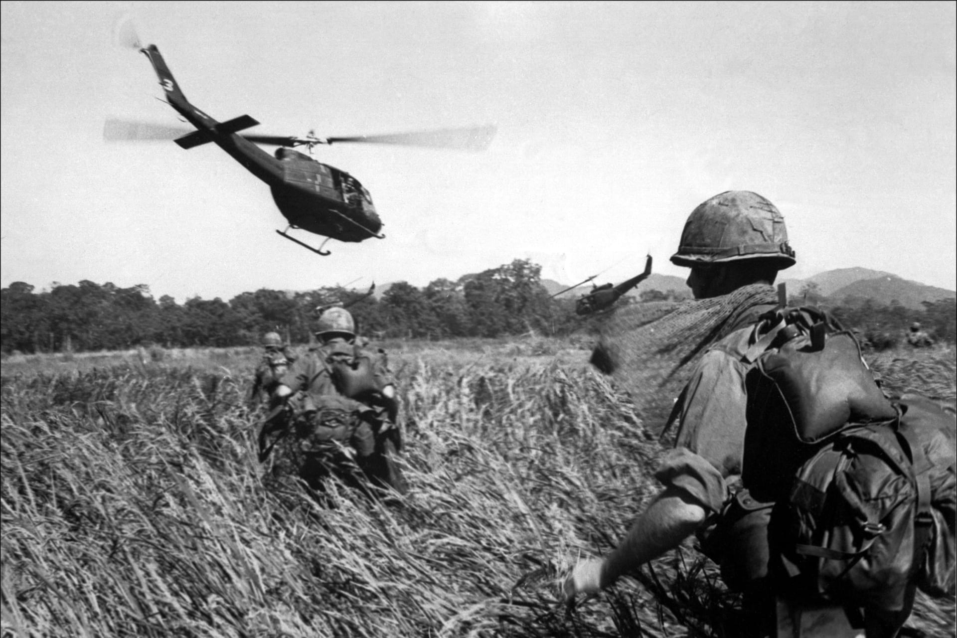 American soldiers of the 173th airborne are evacuated by helicopter from a Vietcong position, December 11, 1965.