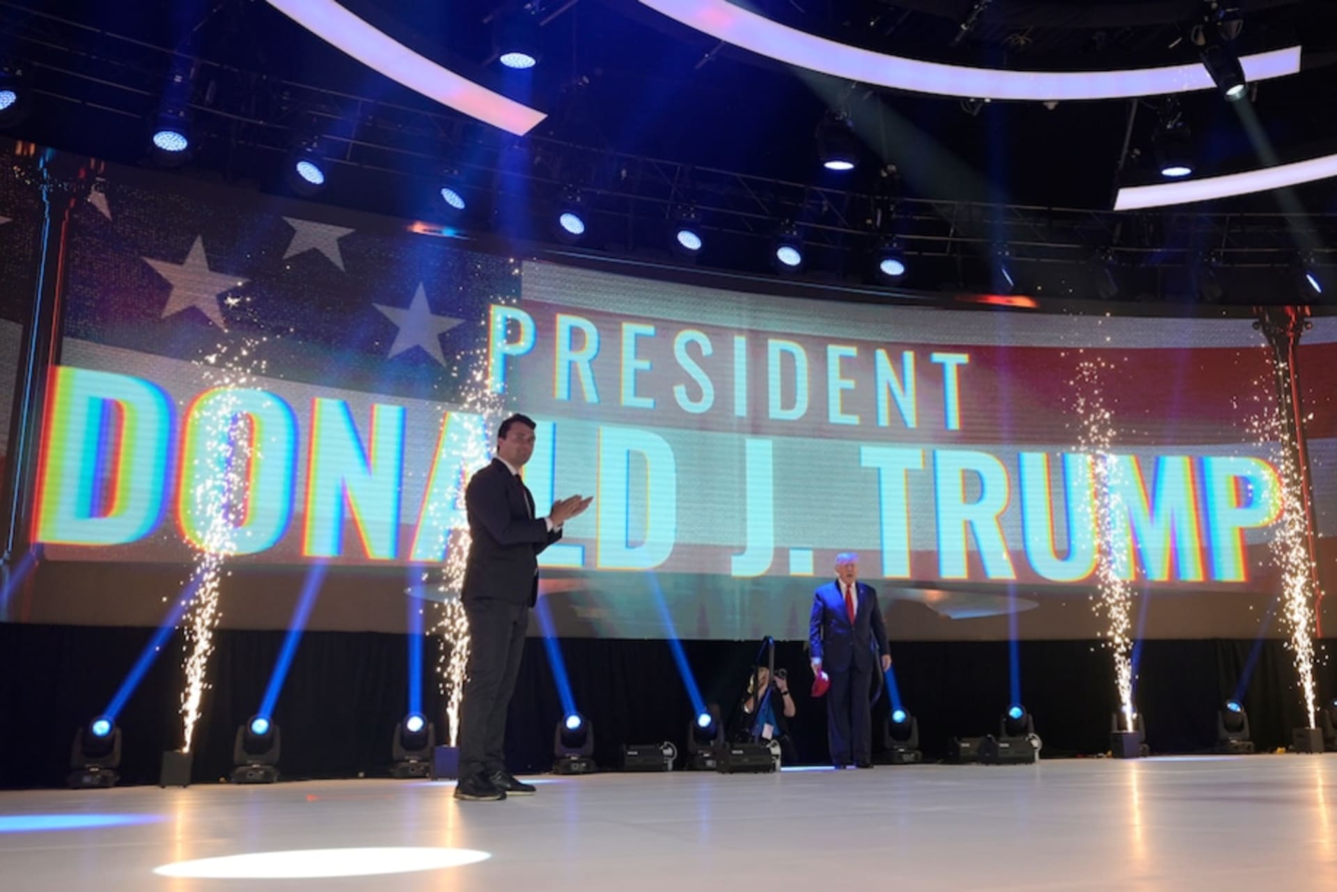 Former president Donald Trump walks on the stage before addressing attendees during the Turning Point USA Student Action Summit on July 23 in Tampa.