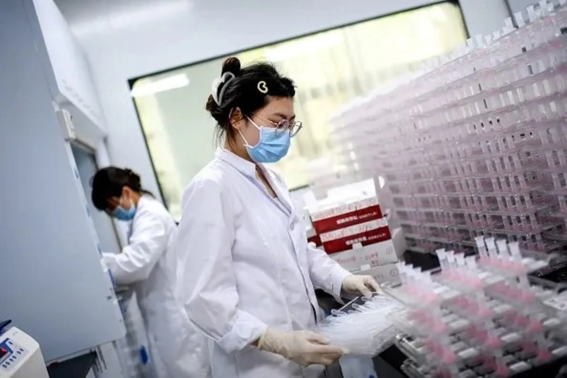 <p>This photo, taken on June 15, 2023, shows a laboratory technician conducting artificial intelligence–based cervical cancer screening at a test facility in Wuhan, in China’s central Hubei province.</p>
