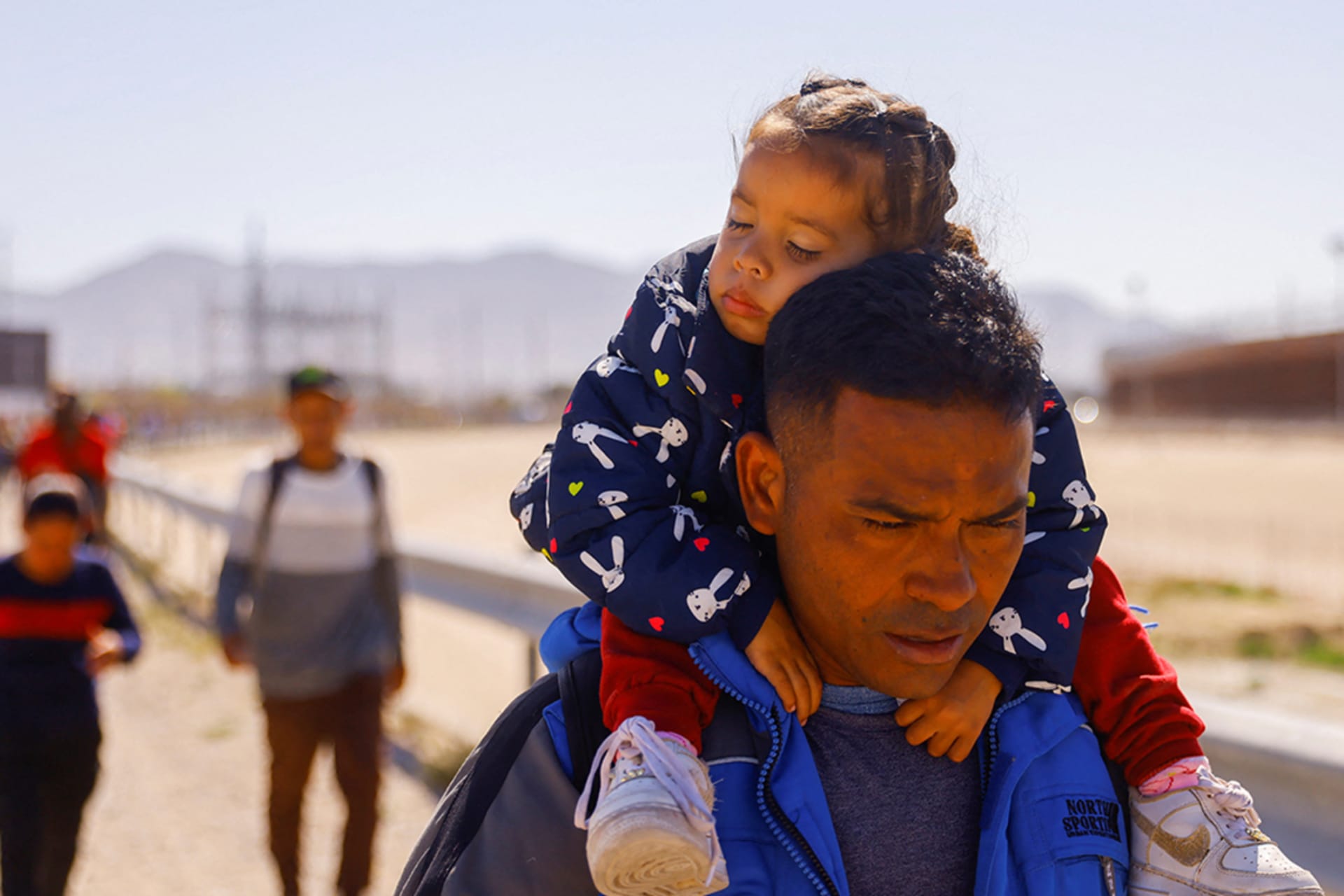 asylum seekers father and daughter