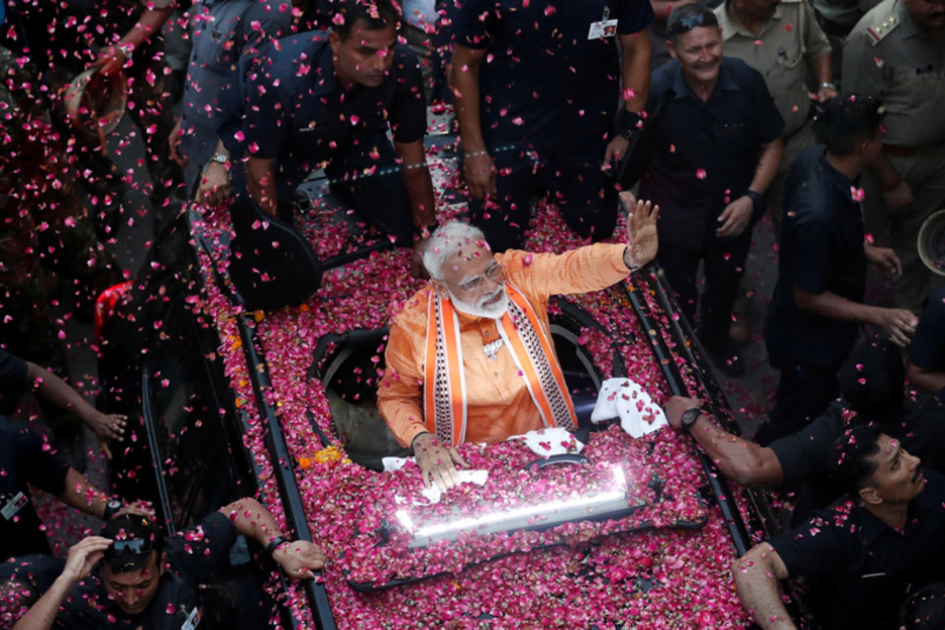 <p>India’s Prime Minister Narendra Modi waves towards his supporters during a roadshow in Varanasi, India.</p>
