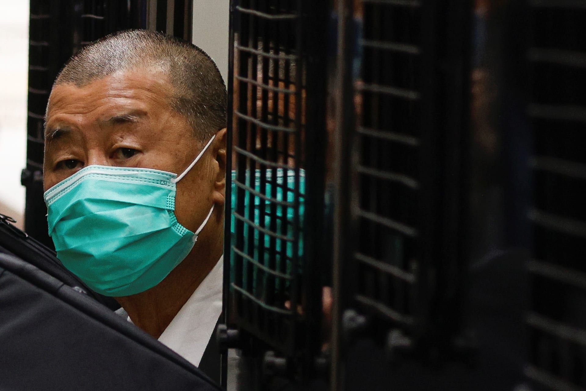 <p>Media mogul Jimmy Lai, founder of Apple Daily, arrives the Court of Final Appeal by prison van in Hong Kong</p>
