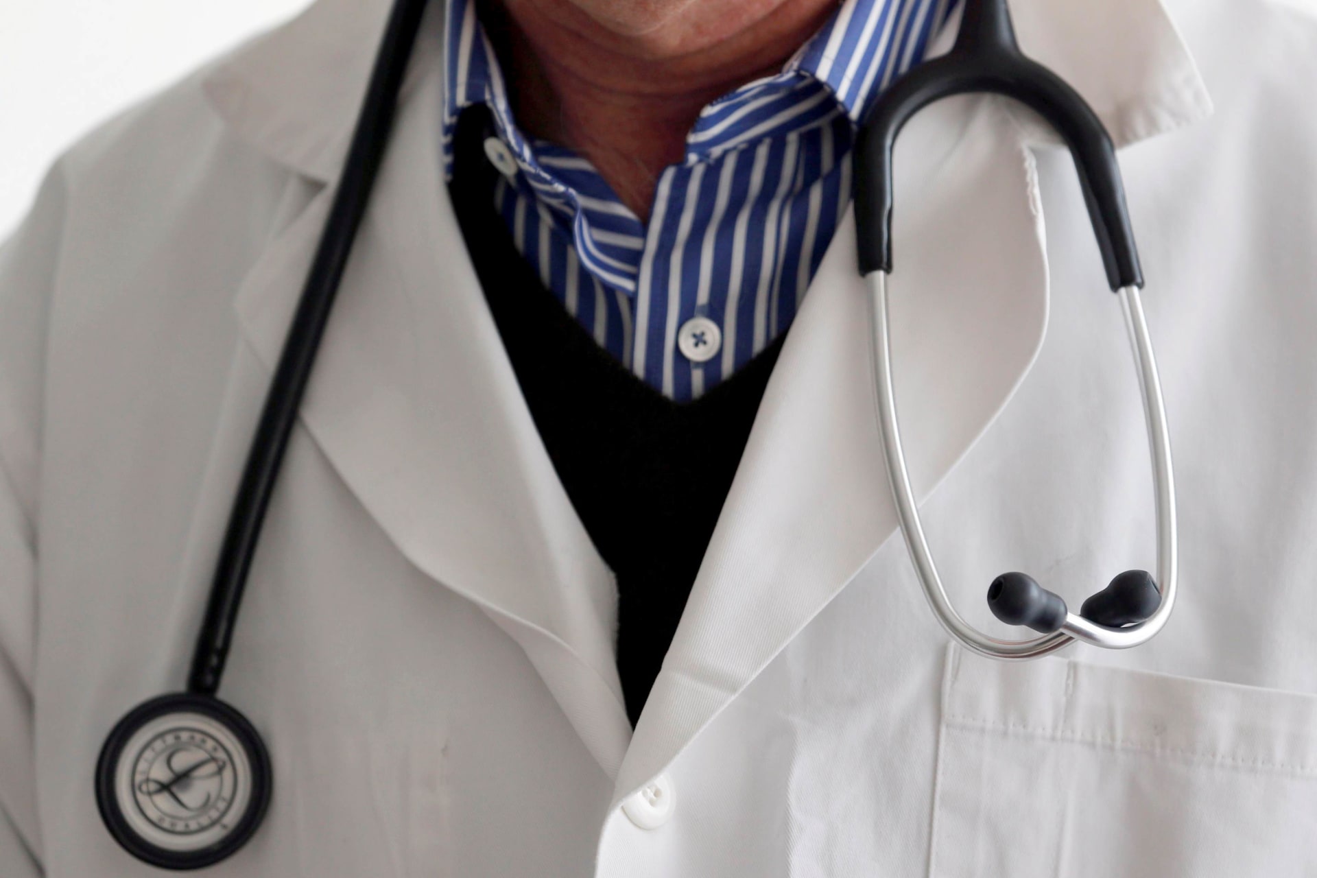 Doctor with stethoscope and white coat