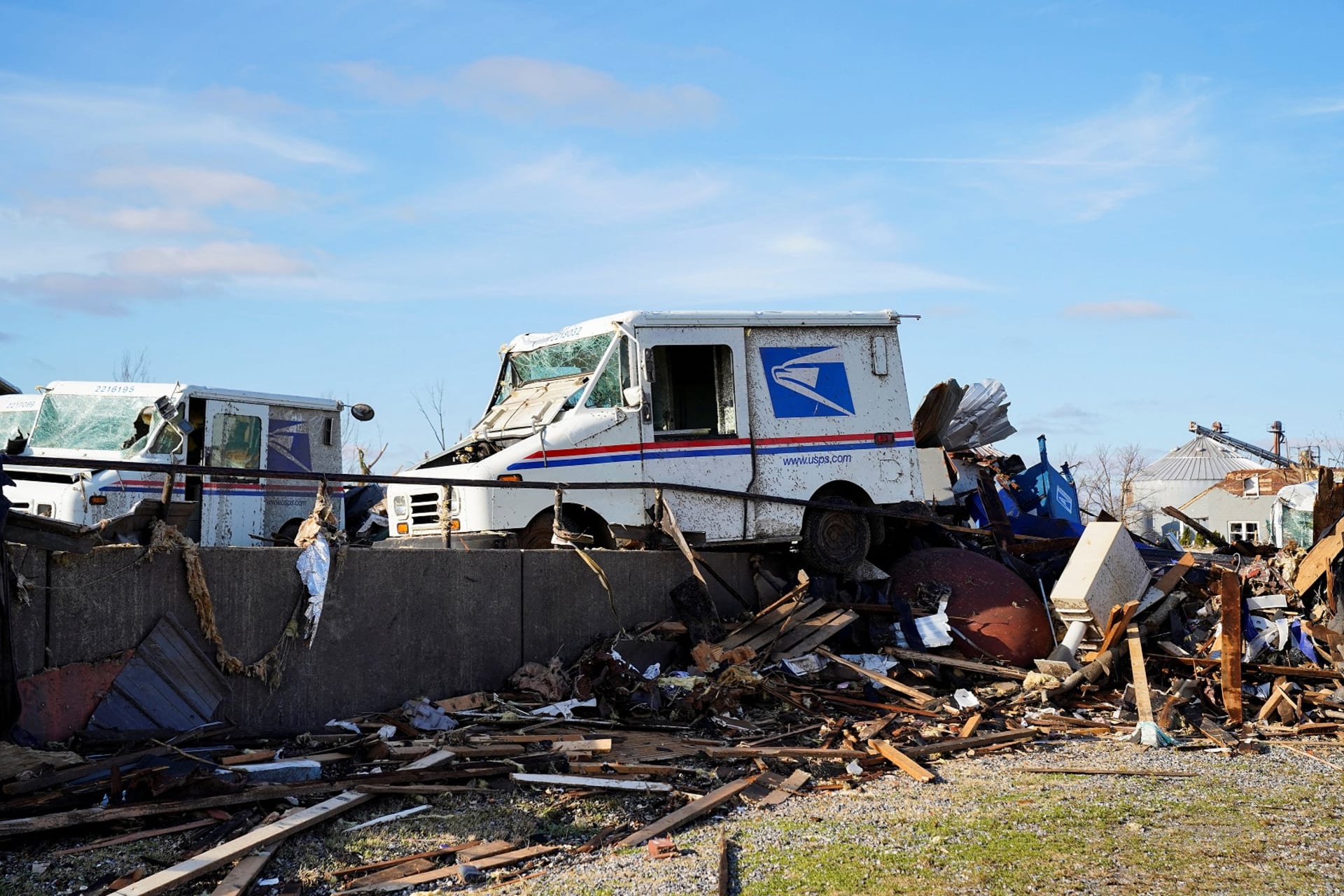 <p>A USPS mail truck is seen badly damaged after a devastating outbreak of tornadoes ripped through several U.S. states, in Mayfield, Kentucky, U.S. December 11, 2021.</p>