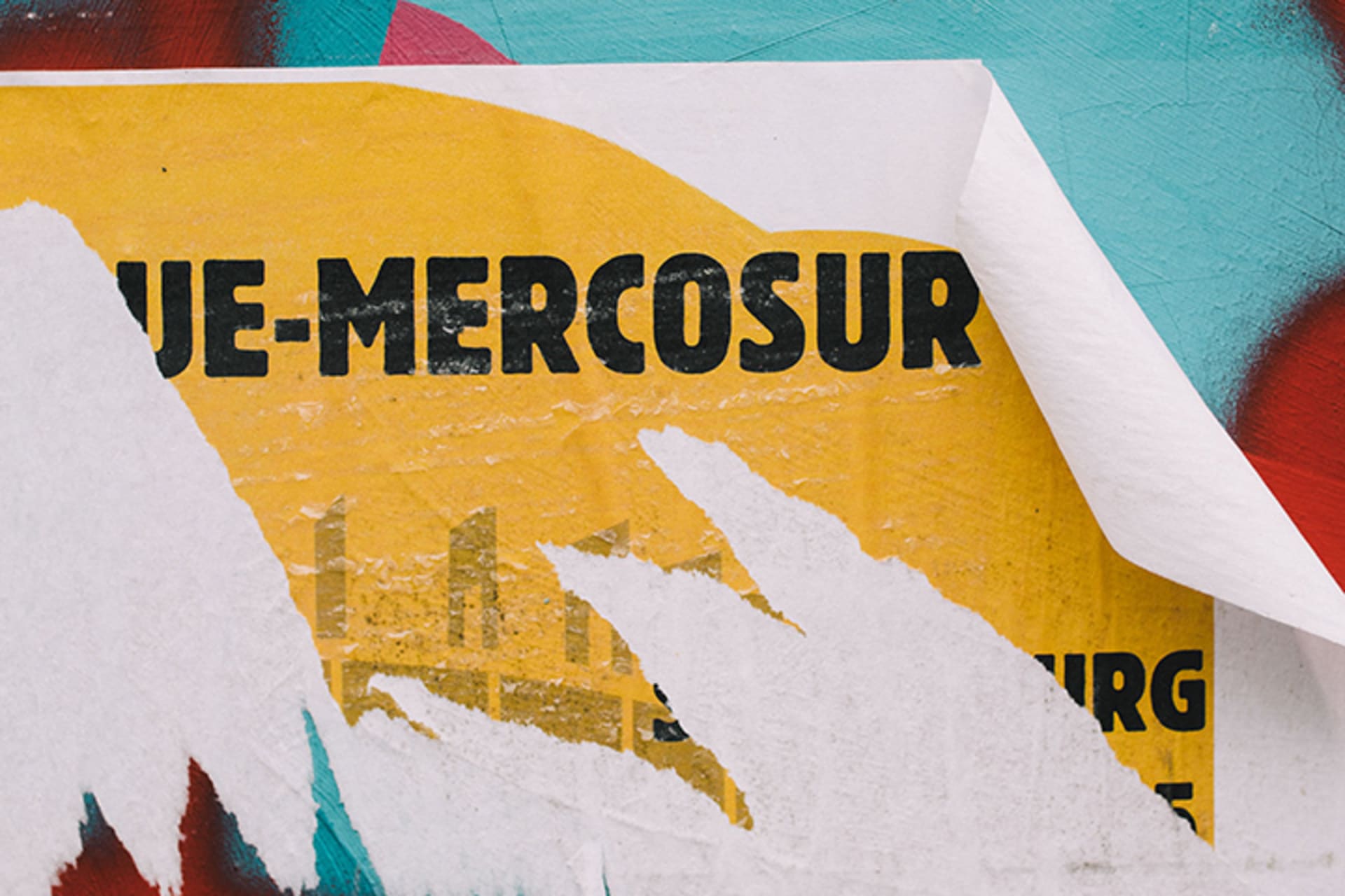 A poster about Mercosur is torn down in a street in Strasbourg, France.