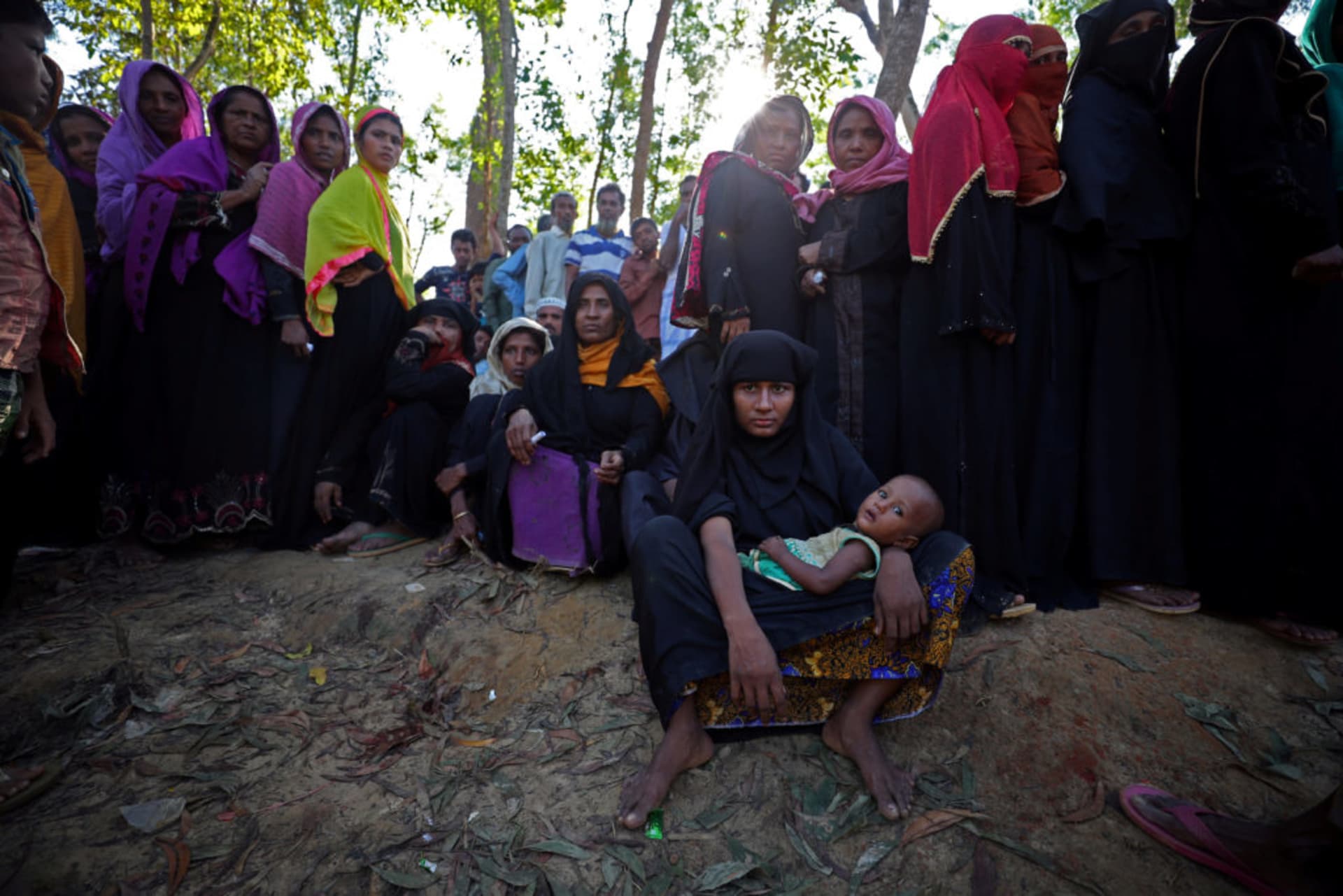 <p>Rohingya line up to receive humanitarian aid in Kutupalong refugee camp near Cox’s Bazar, Bangladesh, on Oct. 23. </p>
