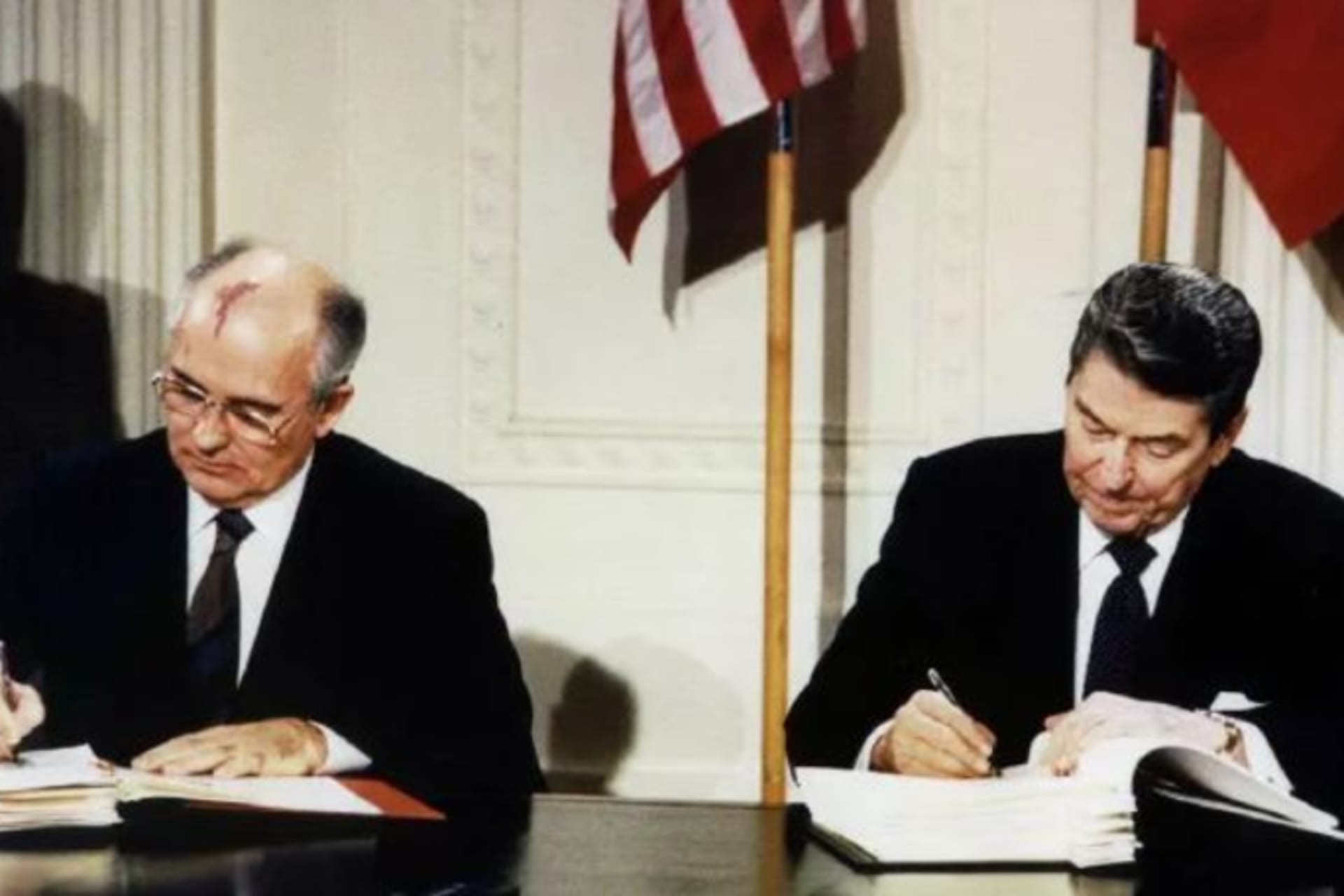 Presidents Ronald Reagan, right, and Mikhail Gorbachev sign the Intermediate-Range Nuclear Forces treaty at the White House in 1987 © Reuters