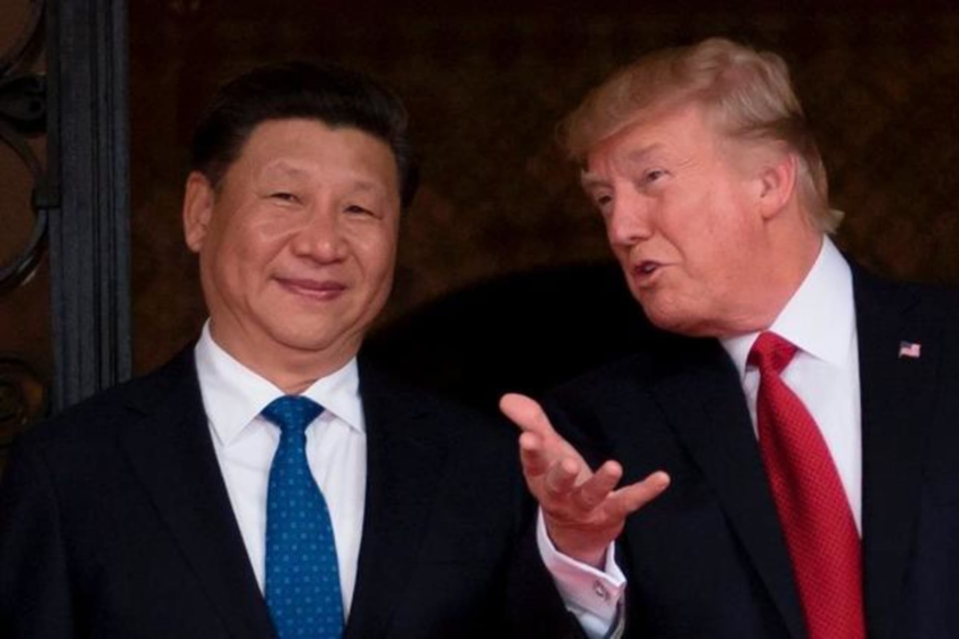 <p>President Donald Trump gestures while talking with Chinese President Xi Jinping during an April 7 meeting at Trump’s Mar-a-Lago estate in Florida. </p>
