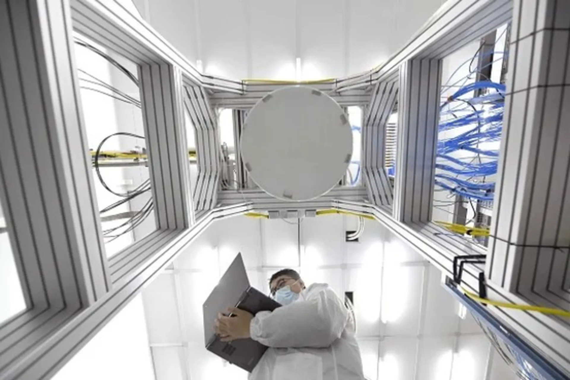 <p>A researcher works inside a superconducting quantum computing laboratory at Beijing Academy of Quantum Information Sciences in February 2021 in Beijing, China.</p>
