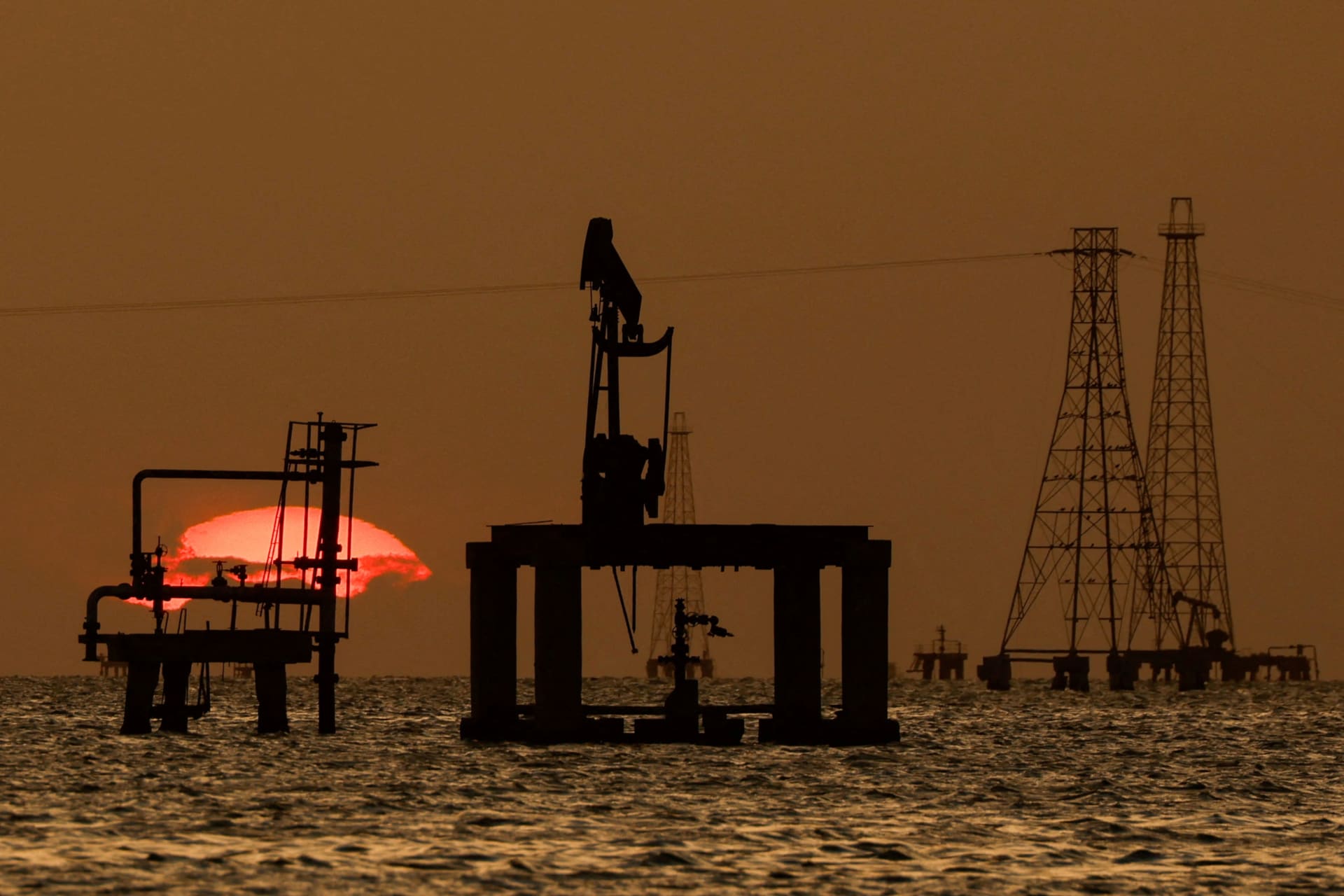 FILE PHOTO: Oil platforms and pump jacks are seen in Venezuela