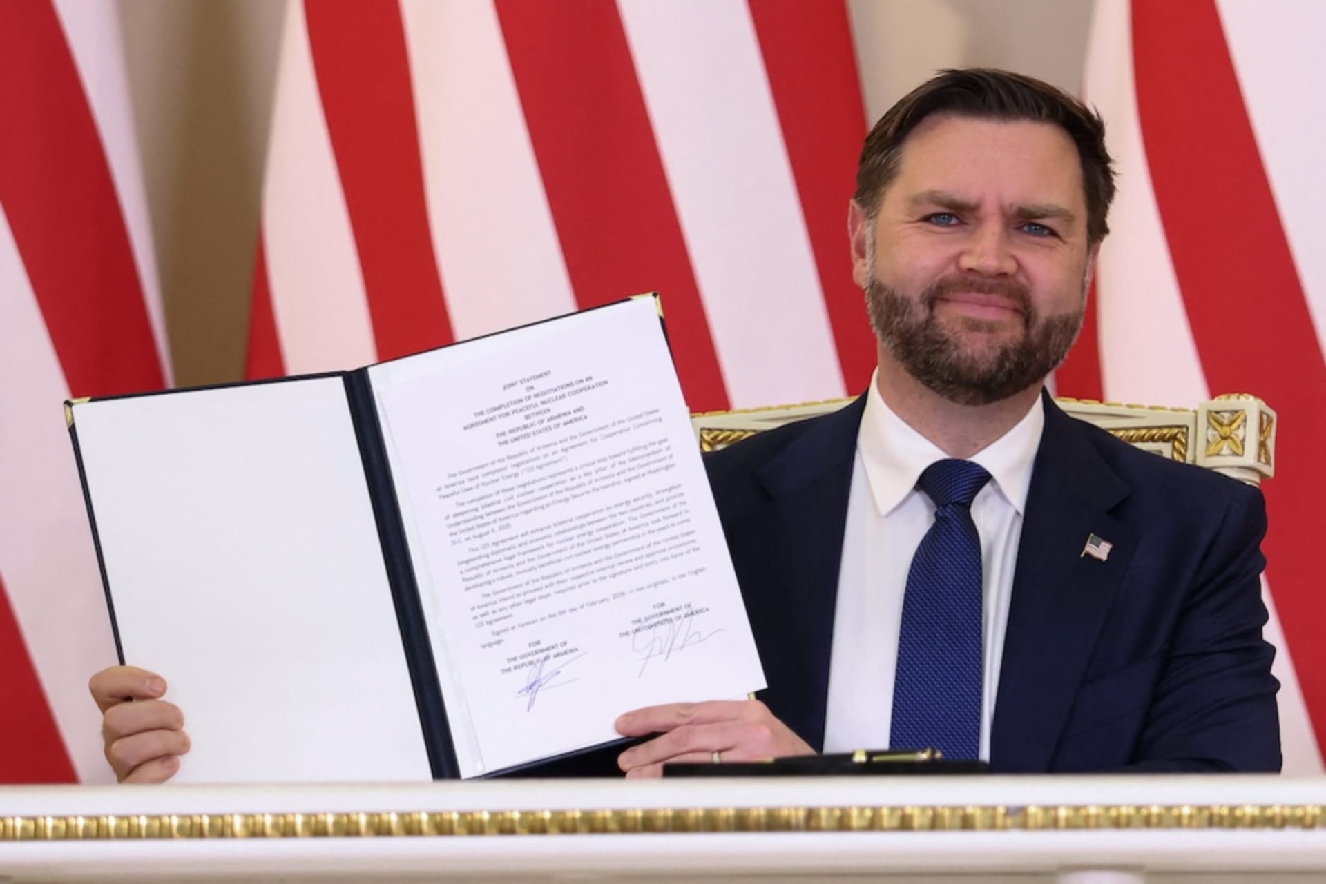 <p>U.S. Vice President JD Vance holds a copy of ‘Joint Statement on the Completion of Negotiations on an Agreement for Peaceful Nuclear Cooperation between the United States of America and the Republic of Armenia’, which he and Armenia’s Prime Minister Nikol Pashinyan signed, at the President’s Residence in Yerevan, Armenia, February 9, 2026. </p>

