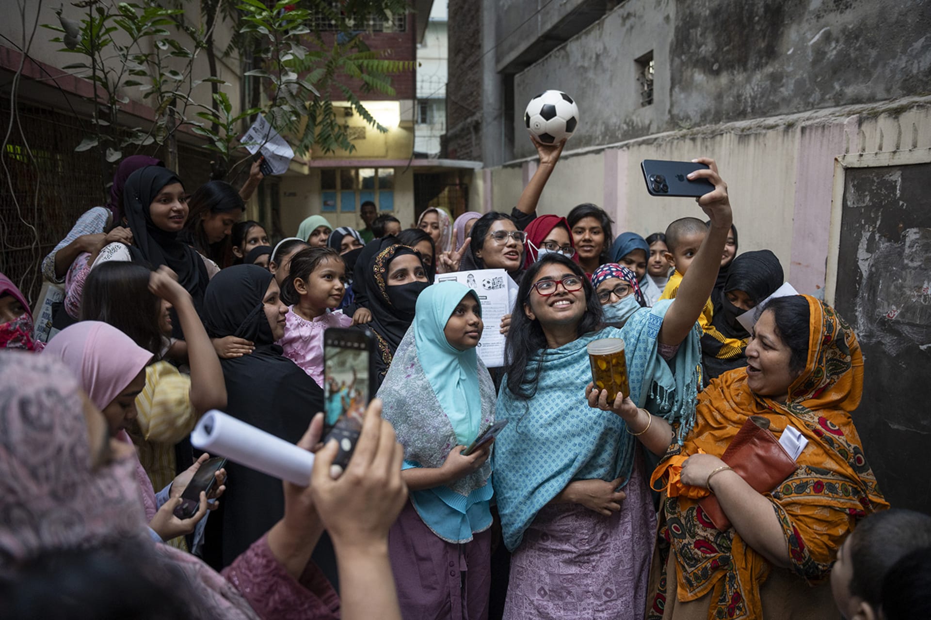 Image of Bengali women taking a selfie.