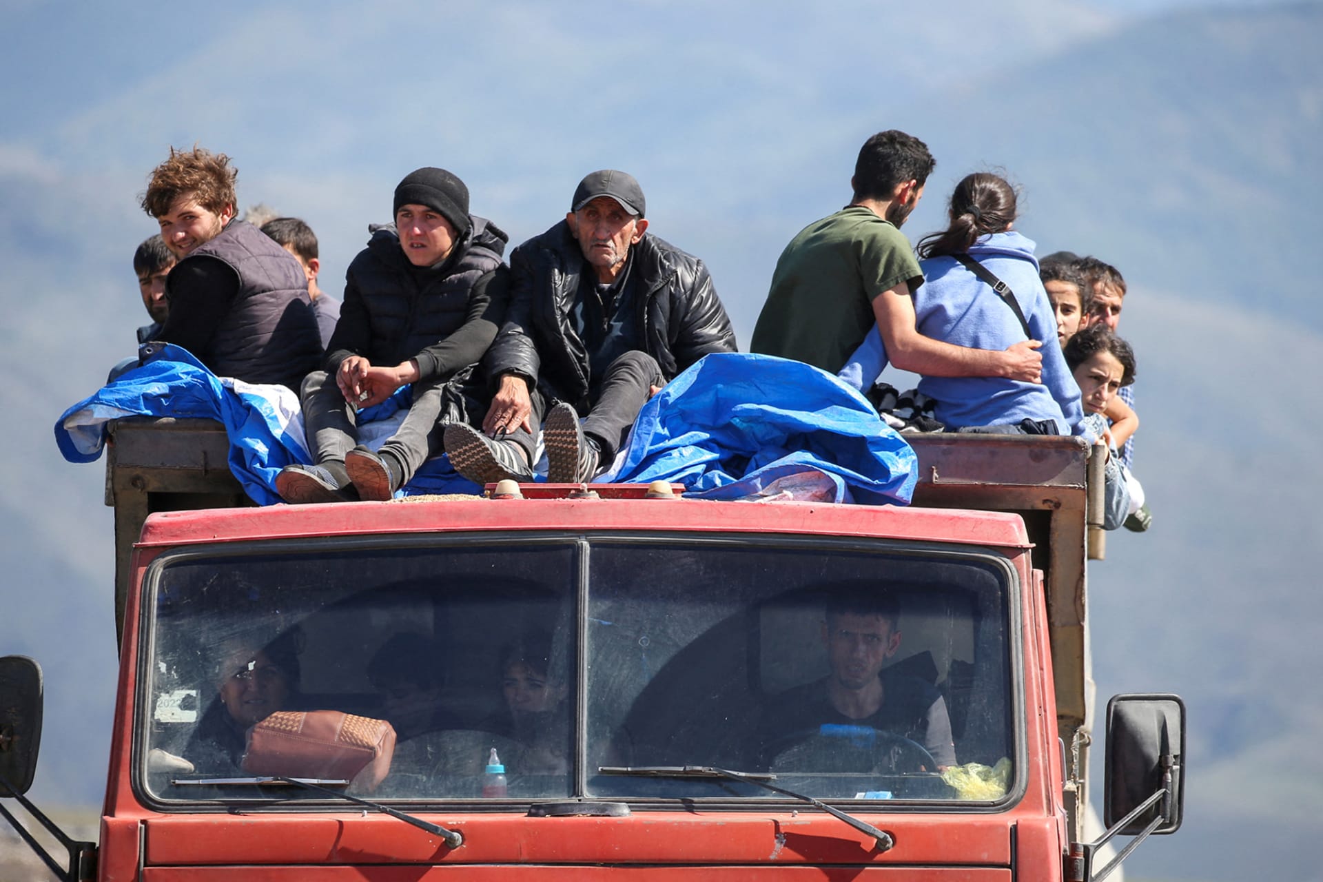 <p>KORNIDZOR, ARMENIA: Refugees evacuating from Nagorno-Karabakh arrive in neighboring Armenia. Irakli Gedenidze/Reuters</p>
