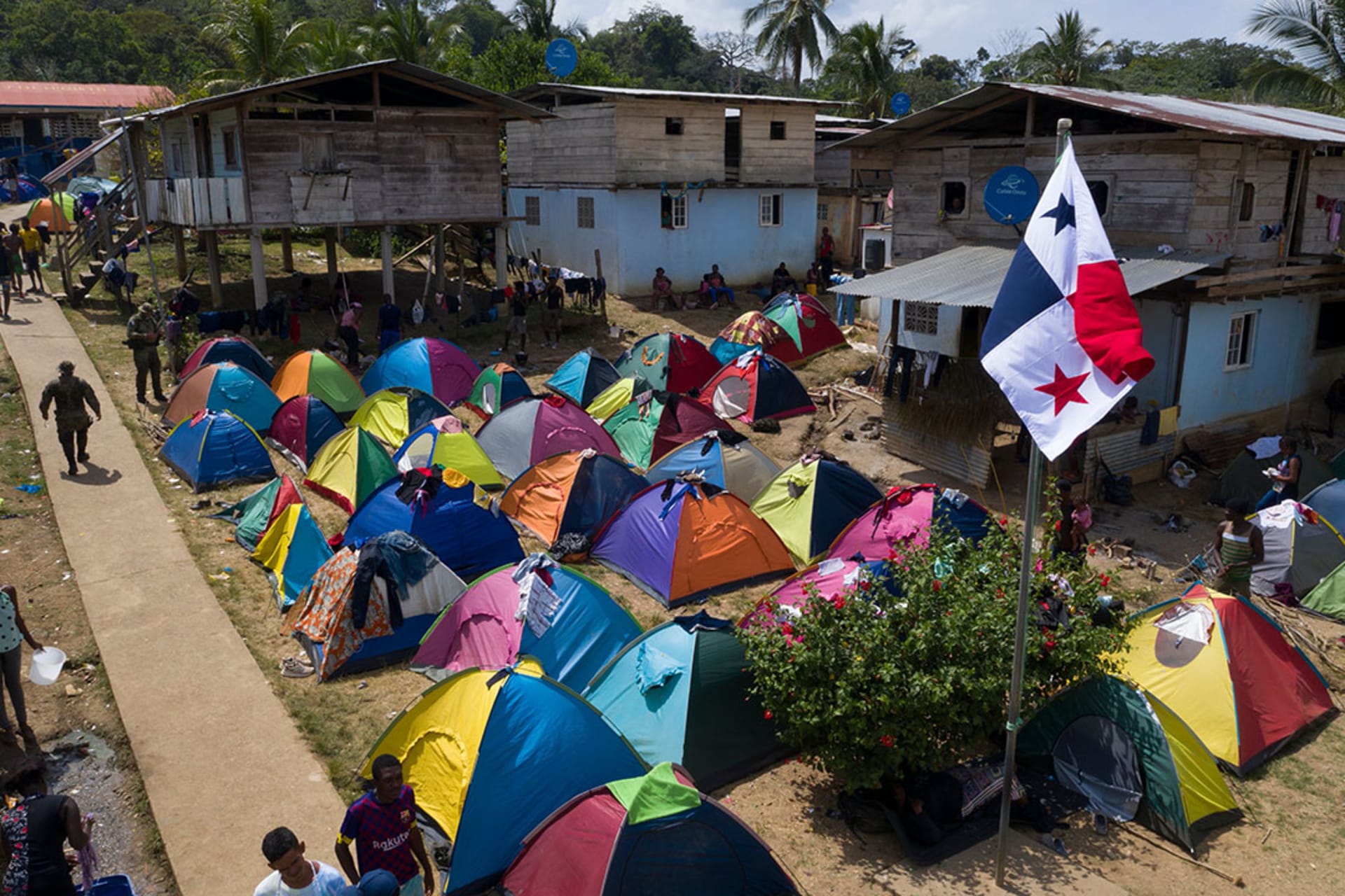 Aerial view of multi-colored tents in Bajo Chiquito village migrant camp.