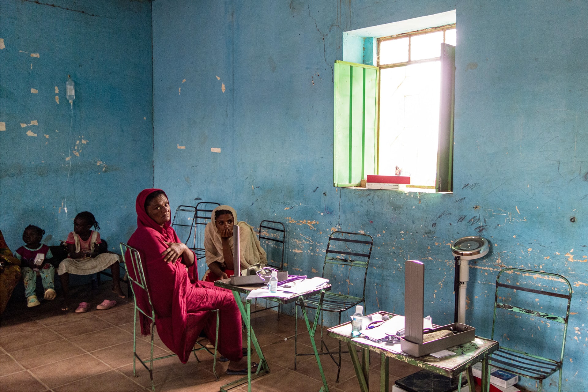 <p>KASSALA, SUDAN: Patients displaced by conflict wait for treatment at a makeshift emergency clinic set up in a former technical education school building. <span class="immersive-image__figcaption-credit">AFP/Getty Images</span></p>
