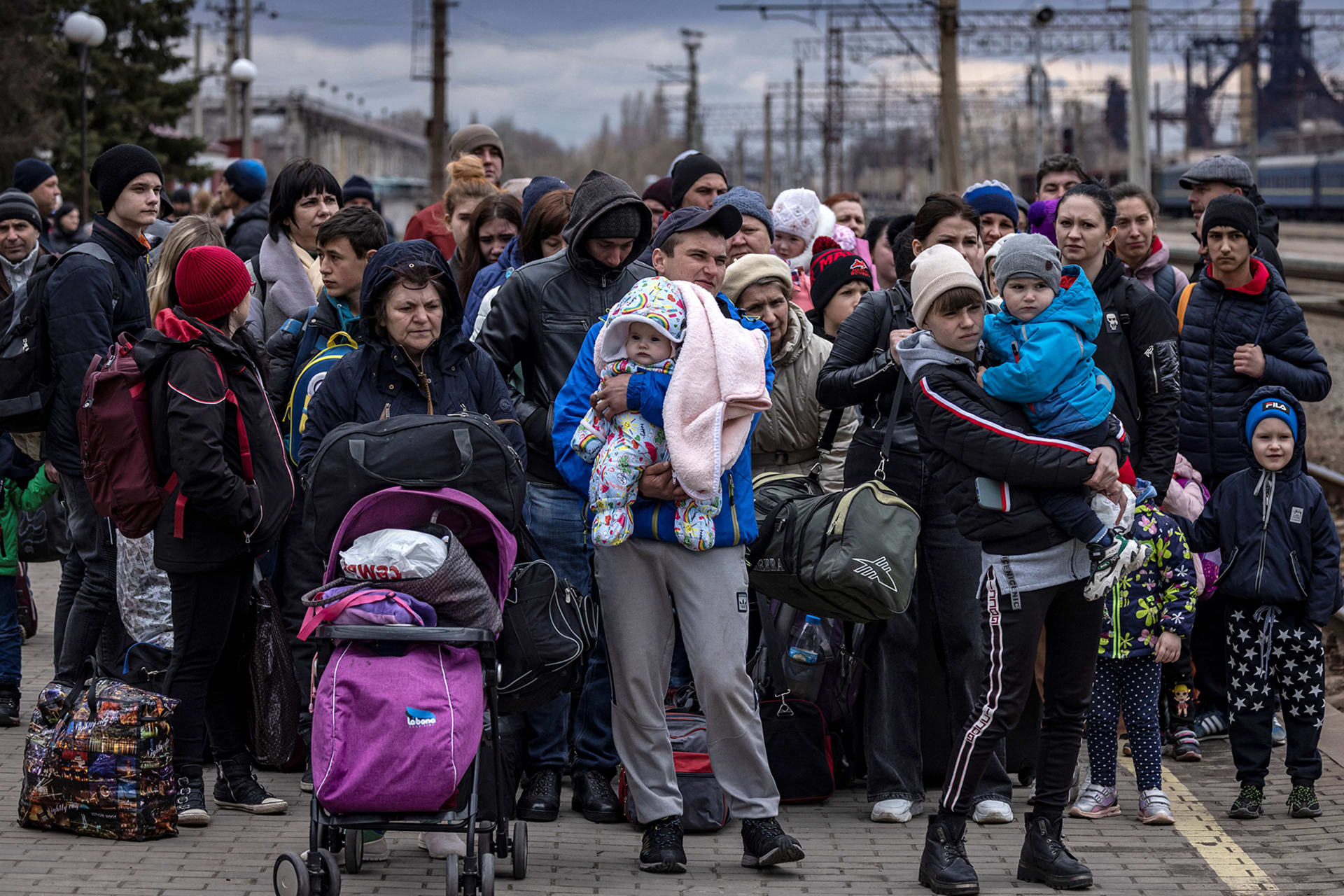 <p>KRAMATORSK, UKRAINE: Families flee Russia’s invasion of the Donbas region in April 2022. Fadel Senna/AFP/Getty Images</p>
