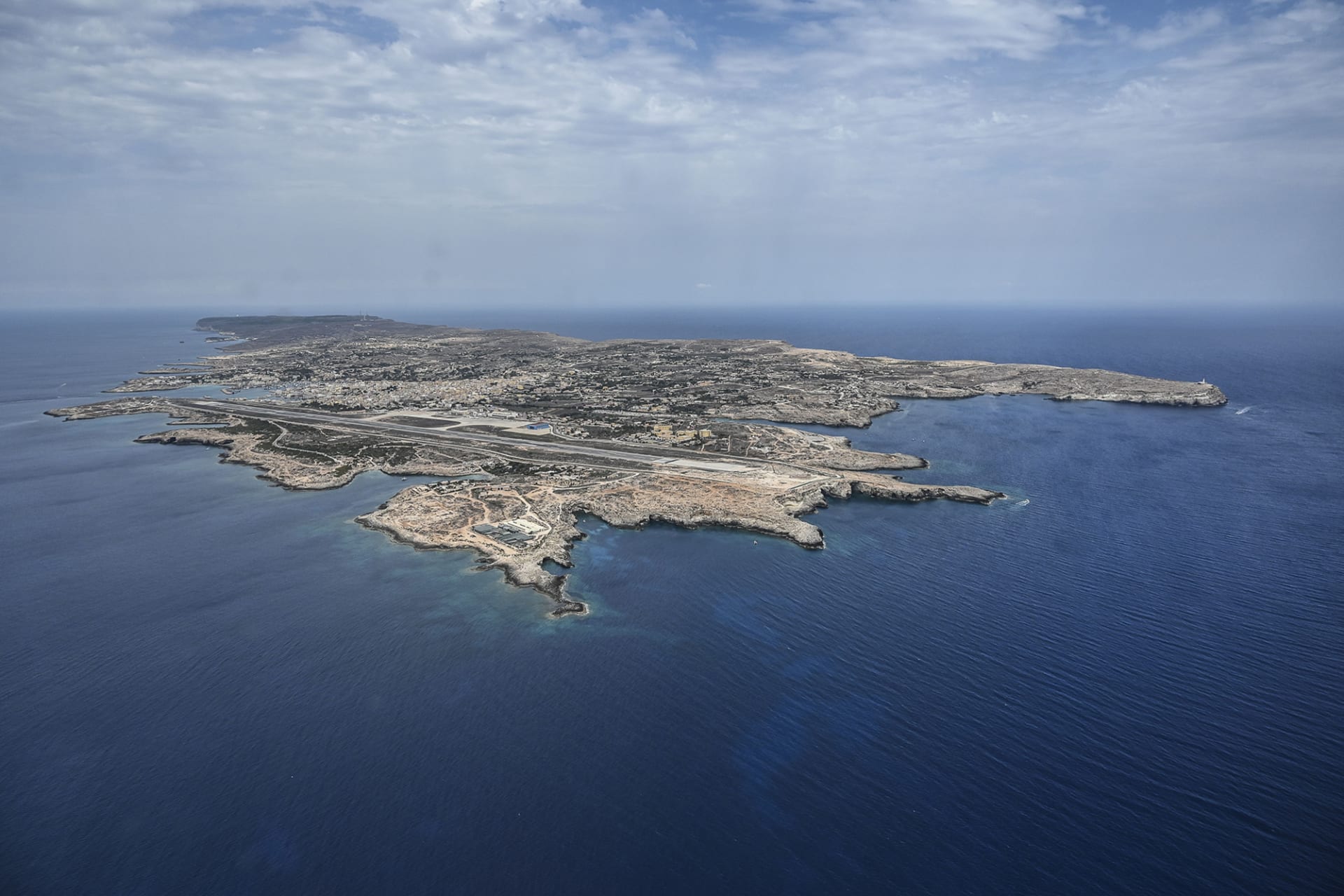 <p>LAMPEDUSA, ITALY: With an area of roughly eight square miles (twenty square kilometers), Lampedusa has a population of only about six thousand people. <span class="immersive-image__figcaption-credit">Fabrizio Villa/Getty Images</span></p>
