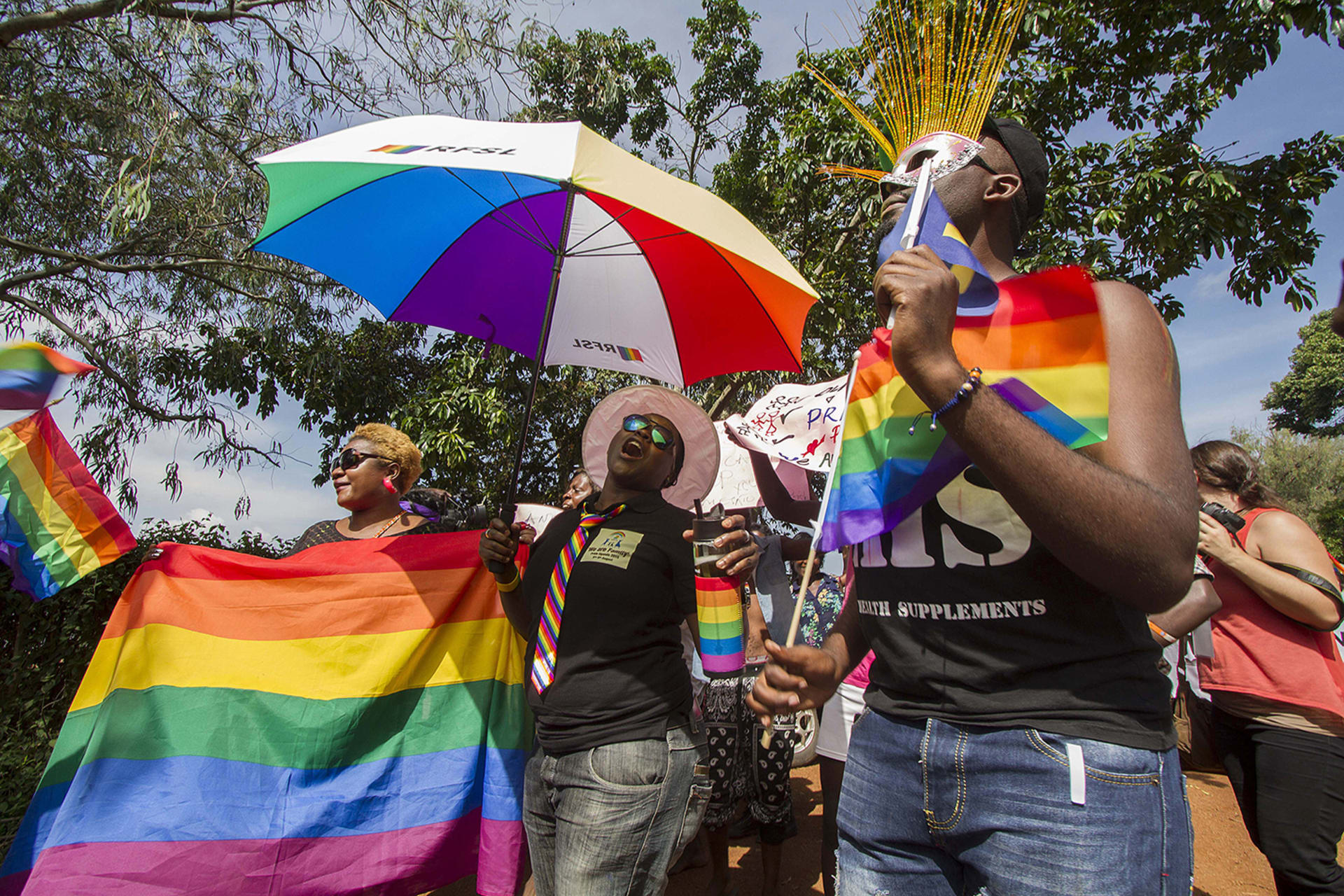 <p>ENTEBBE, UGANDA: Ugandan activists take part in a Gay Pride parade, on August 8, 2015. Less than ten years later, the Ugandan Constitutional Court upheld an anti-homosexuality act that criminalizes consensual same-sex conduct in the country.</p>
