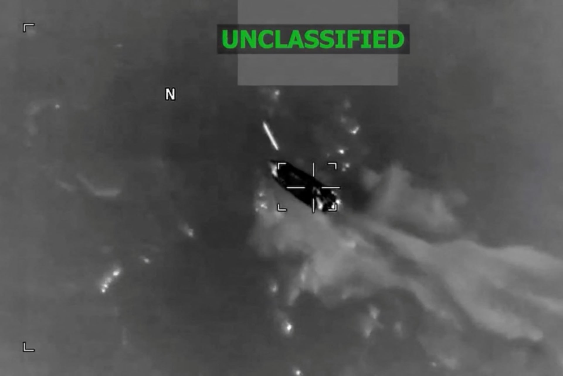 <p>A projectile approaches a vessel during what the U.S. military says was a kinetic strike on a suspected drug trafficking vessel in the Caribbean, at an unidentified location in this screen grab obtained from a video released on February 13, 2026.</p>
