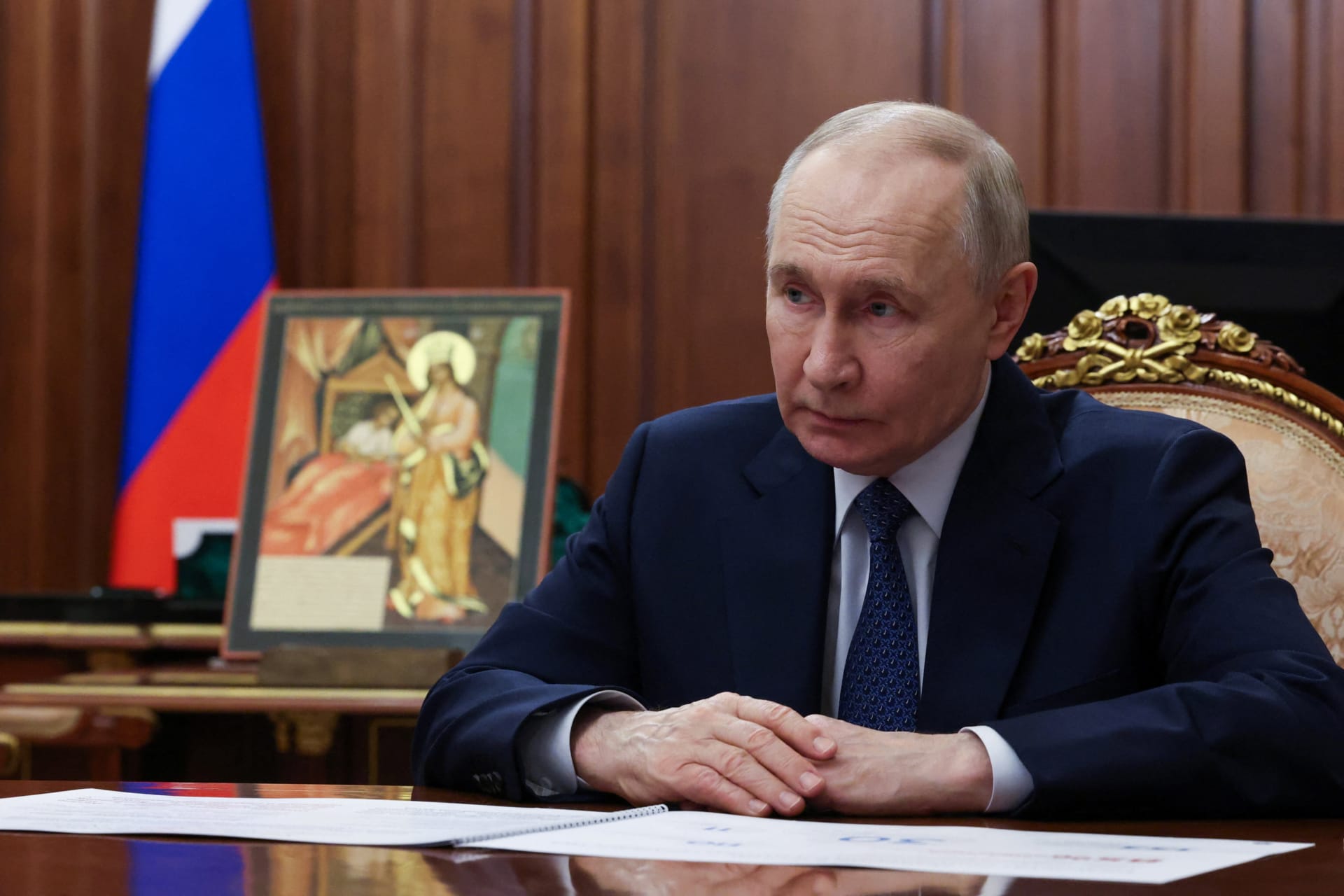 Russian President Vladimir Putin meets with Orthodox Archpriest Alexander Tkachenko in Moscow