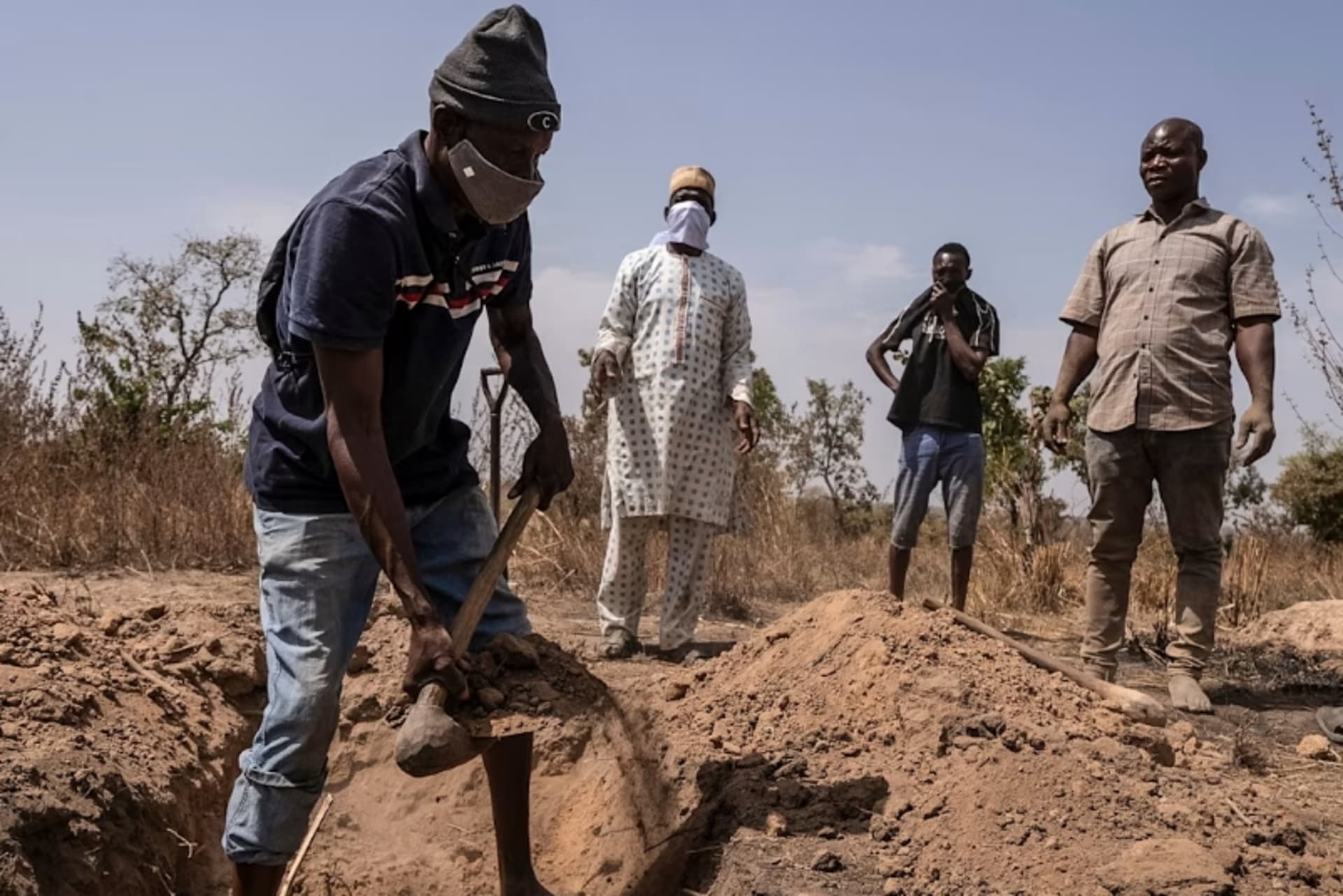 <p>A man digs a grave in Woro to bury a victim of Tuesday’s jihadi attack.</p>
