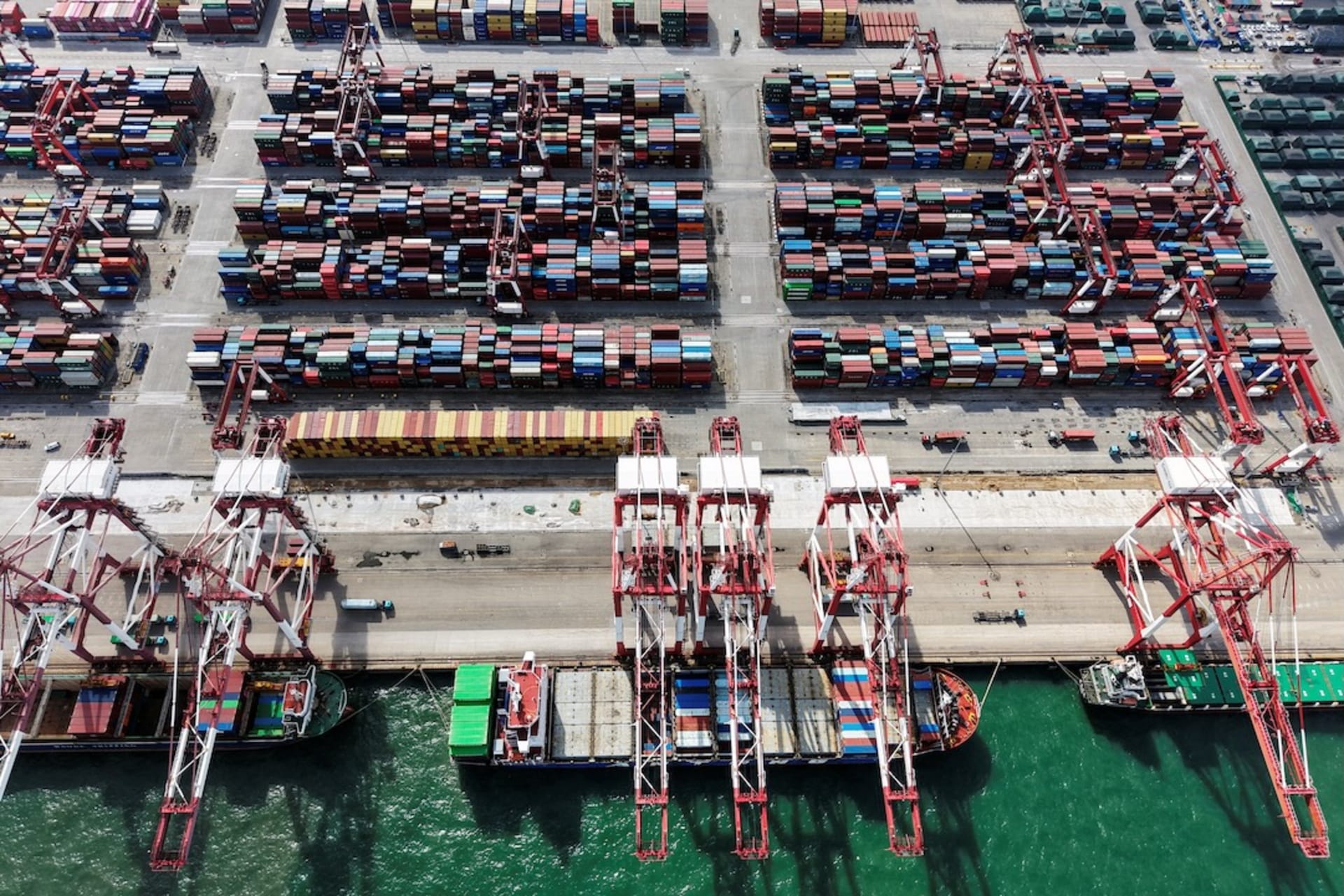 <p>A drone view shows ships and containers at the port in Qingdao, Shandong province, China October 20, 2025.</p>

