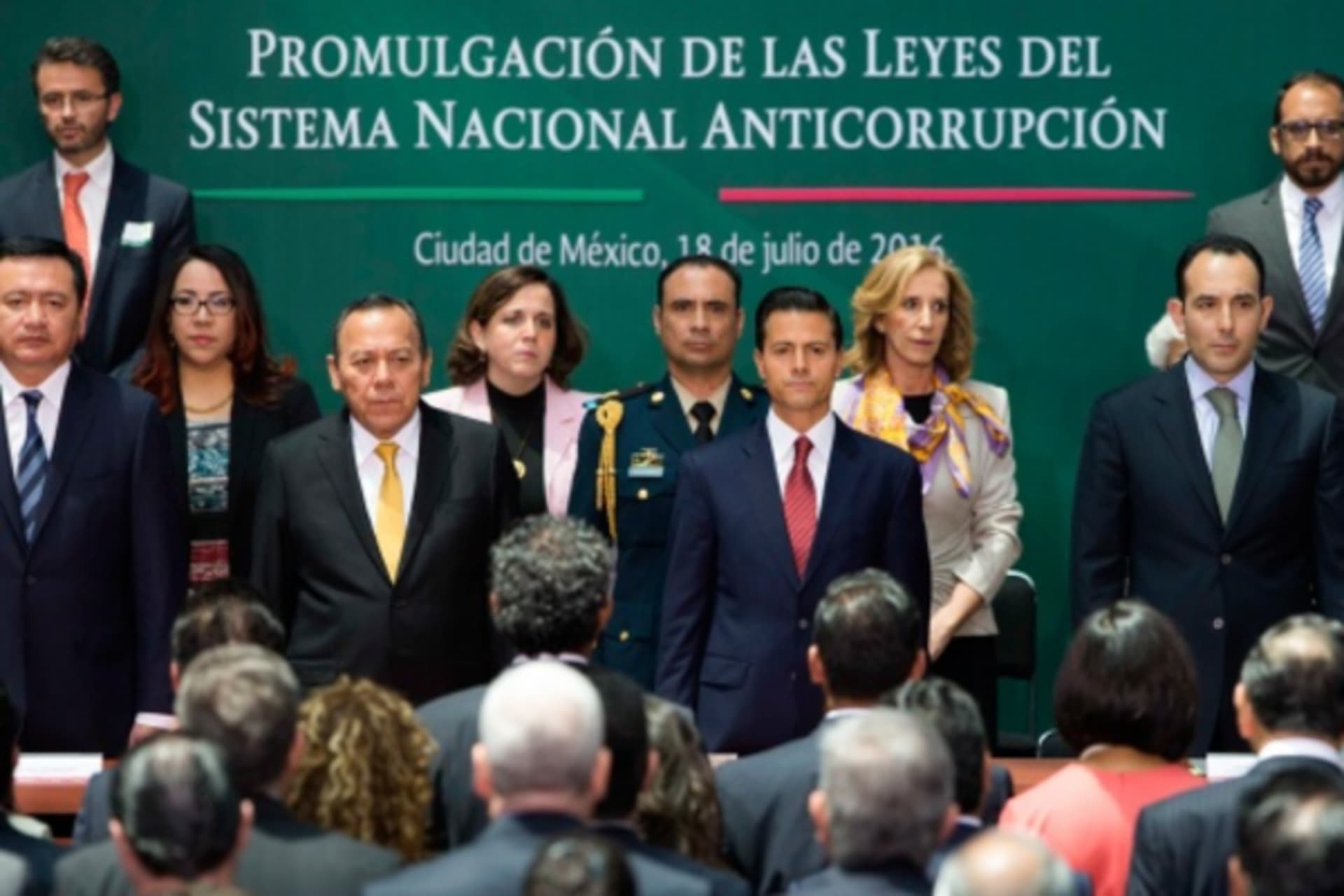 <p>Mexico’s President Enrique Pena Nieto (R) stands during the promulgation of the anti-corruption laws at the National Palace in Mexico City, Mexico July 18, 2016.</p>
