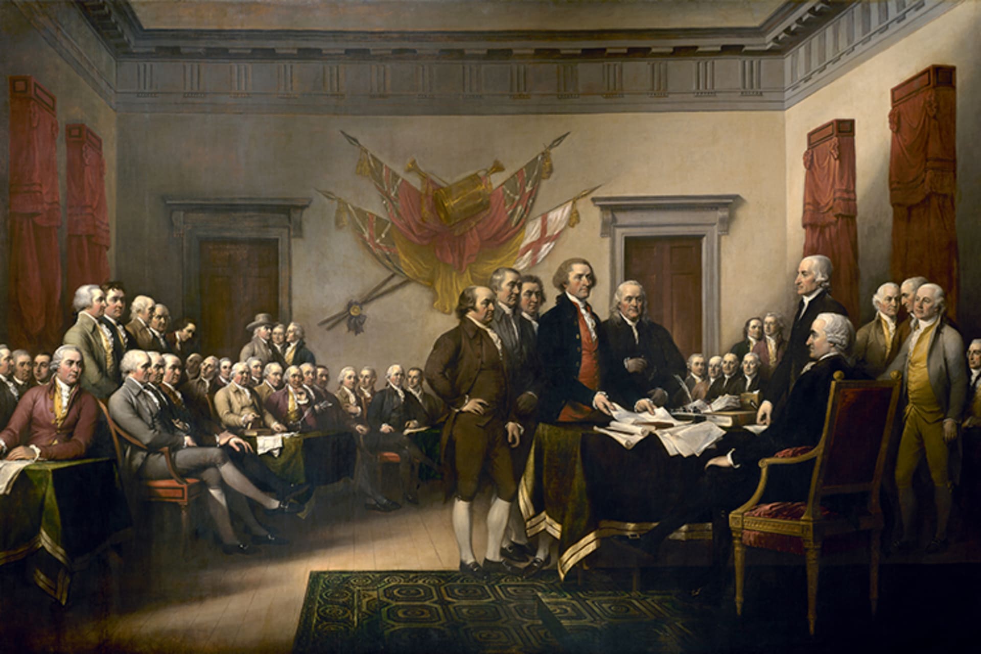 A color painting of the signing of the Declaration of Independence in Philadelphia where all the founding fathers are present.