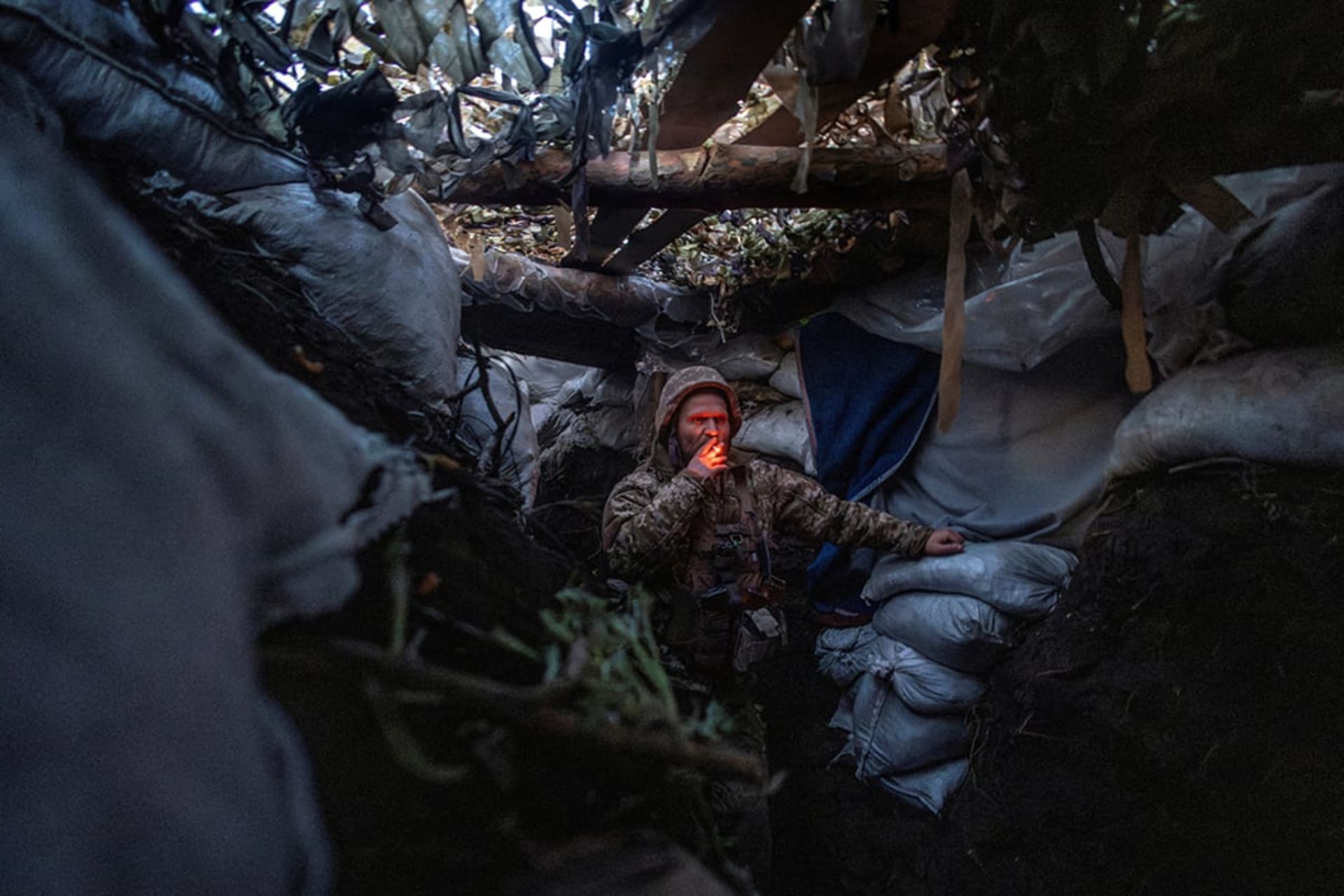 <p>Infantry soldier Viktor of Ukraine’s 58th Motorized Brigade smokes while standing in a frontline trench in the Donetsk region, Ukraine, on April 13, 2024.</p>
