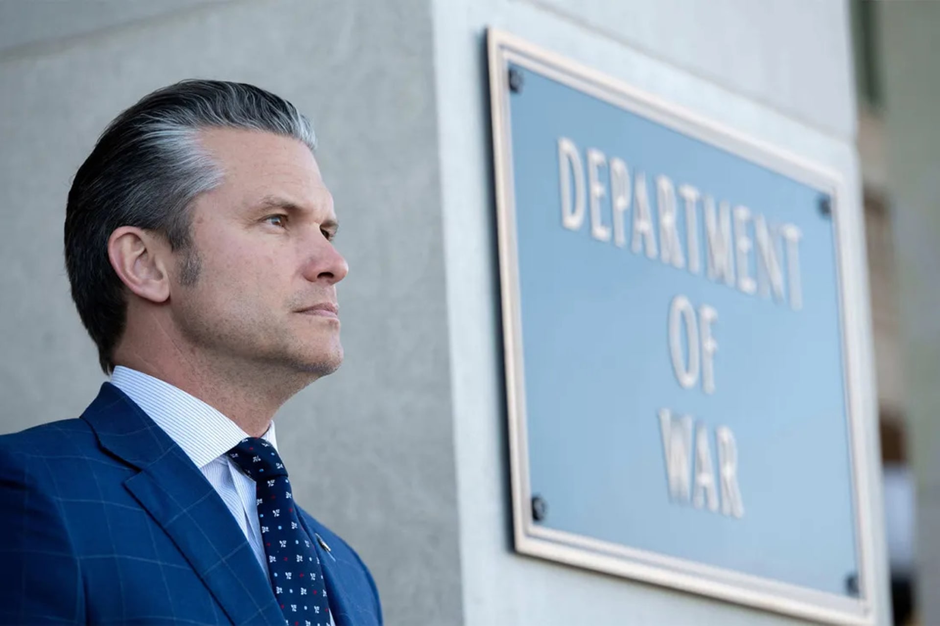<p>War Secretary Pete Hegseth stands outside the Pentagon during a welcome ceremony for the Japanese defense minister at the Pentagon in Washington, Jan. 15, 2026.</p>