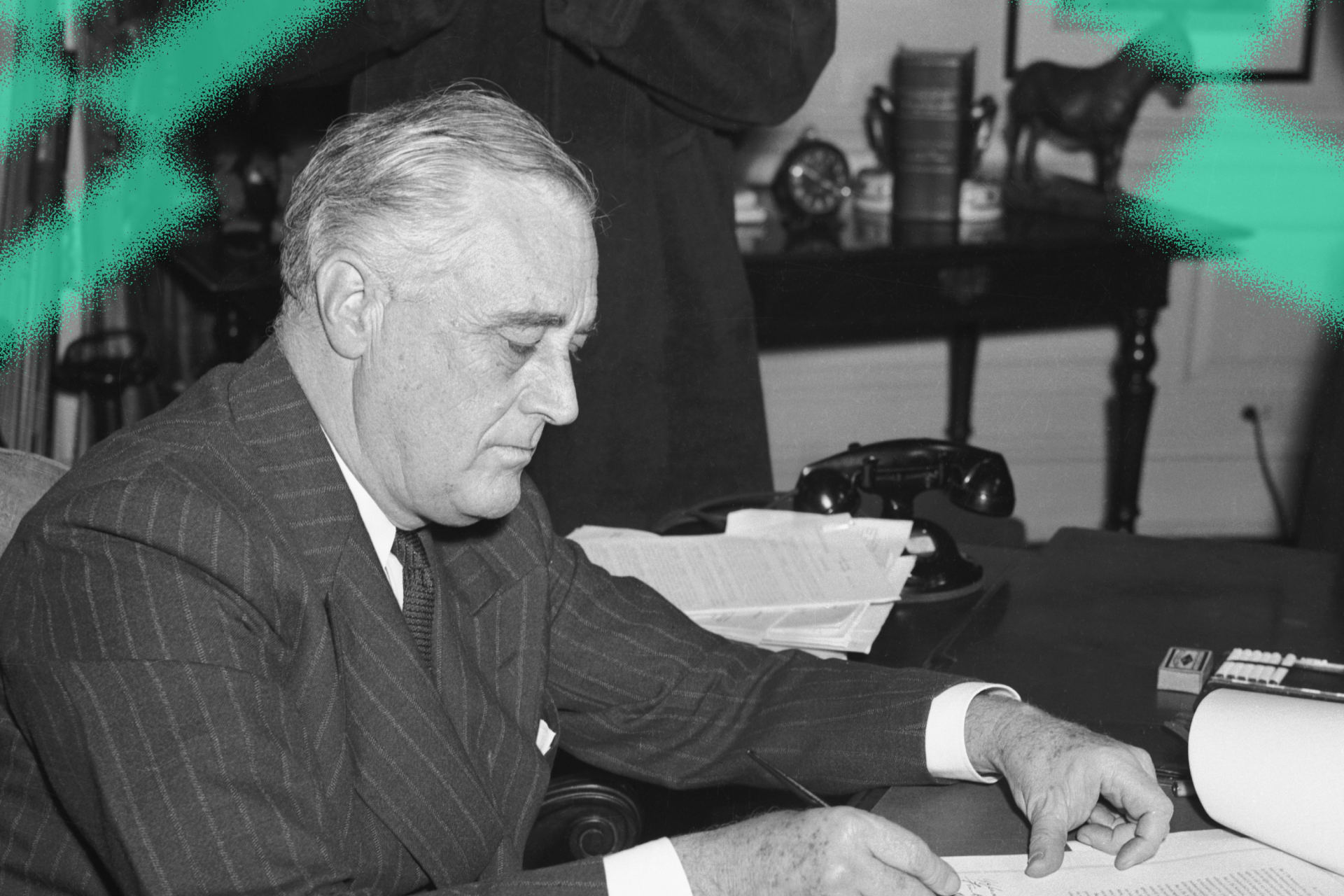 President Franklin D. Roosevelt signing the Lend Lease Bill at the White House in Washington, D.C. on March 11, 1941.