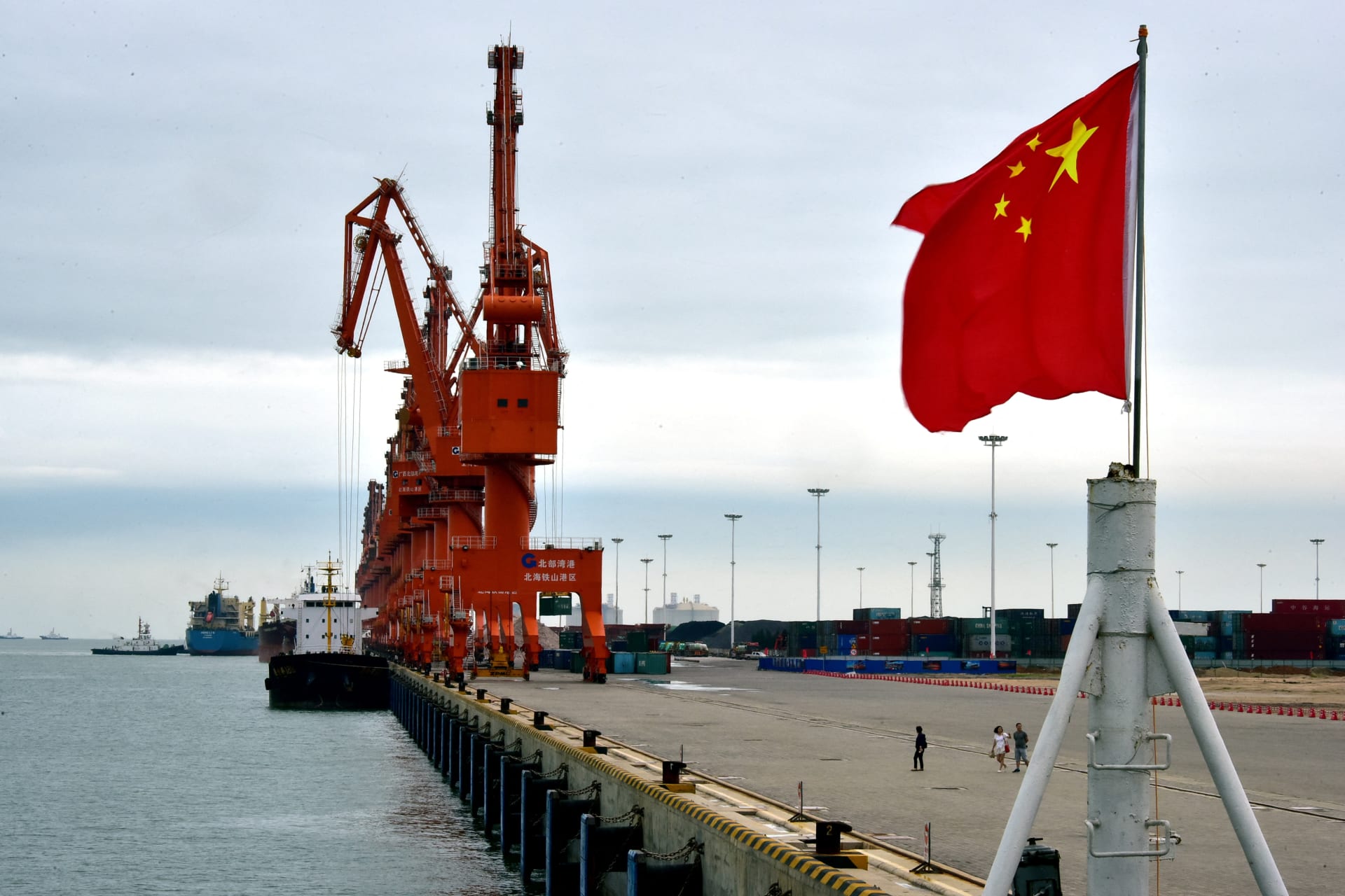 A Chinese national flag flies at a port in Beihai, Guangxi autonomous region, China June 17, 2017. Picture taken June 17, 2017. REUTERS/Stringer