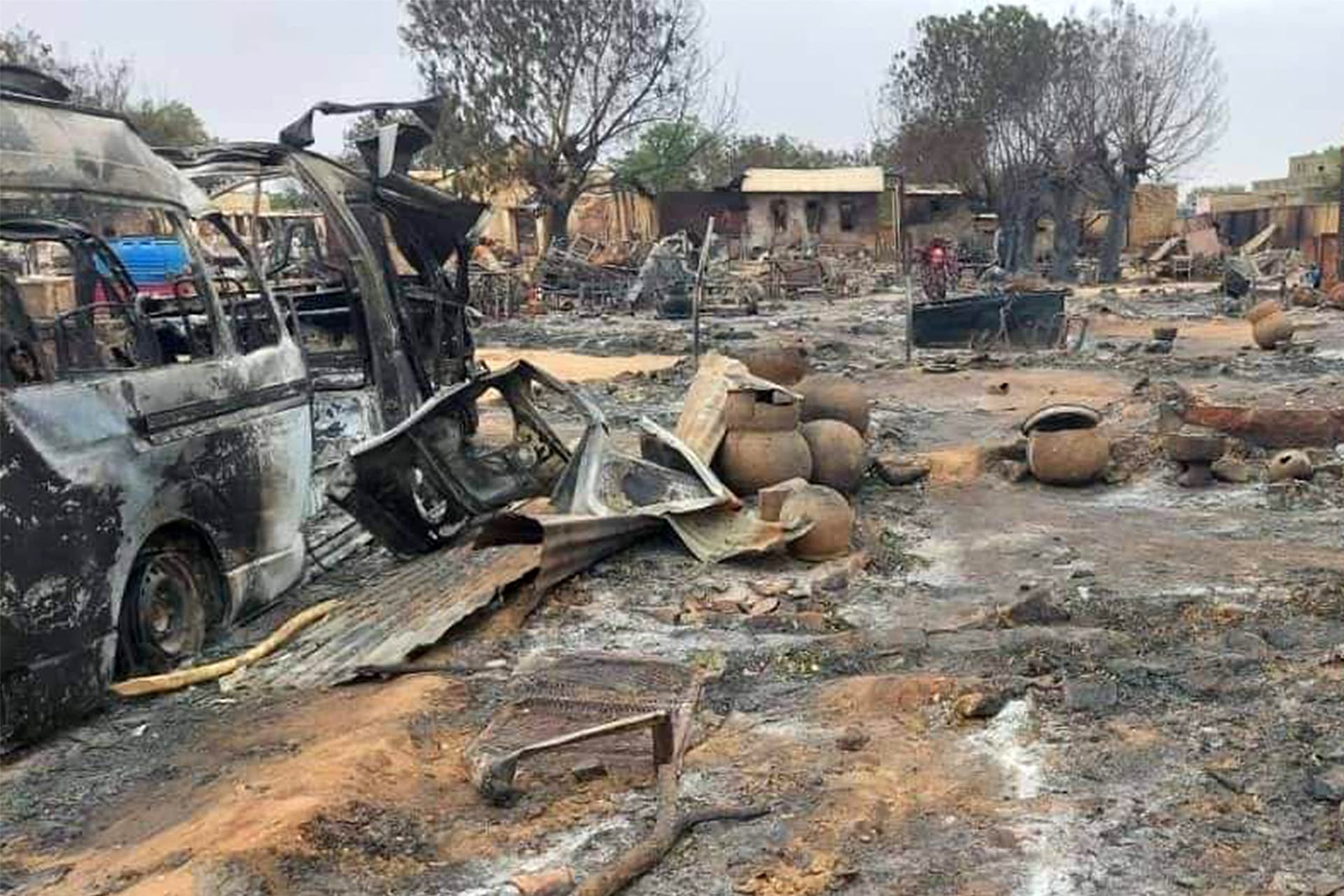 <p>A livestock market in El Fasher is reduced to singed buildings and ashes on September 1, 2023, after fighting tore through the area.</p>
