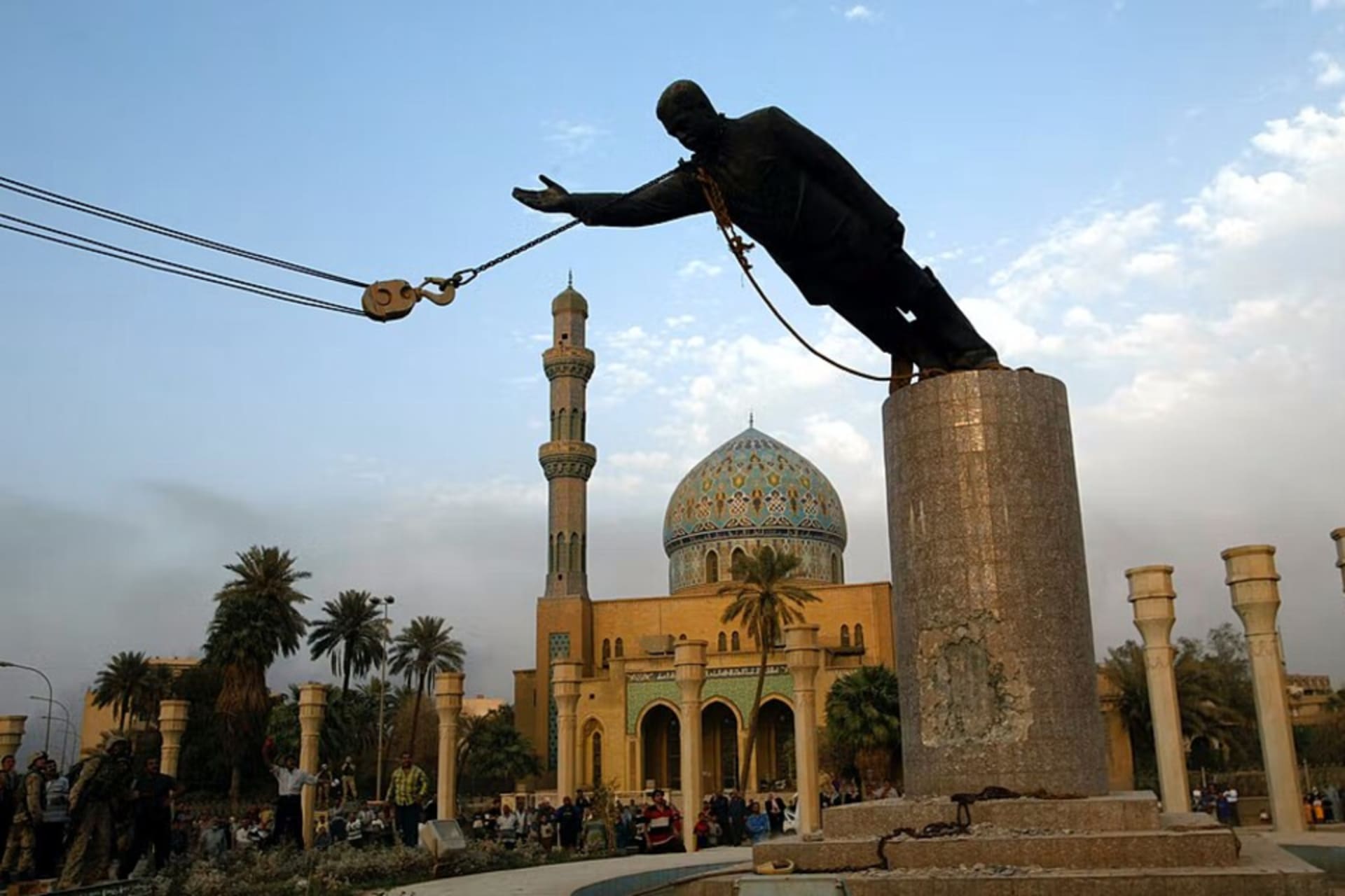 <p>Statue of Saddam Hussein being toppled in Firdos Square in Baghdad after U.S. forces took the city, April 9, 2003.</p>
